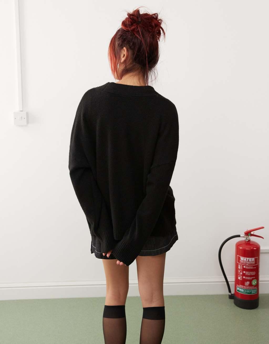 Monki knit button front oversized cardigan in black Product Image