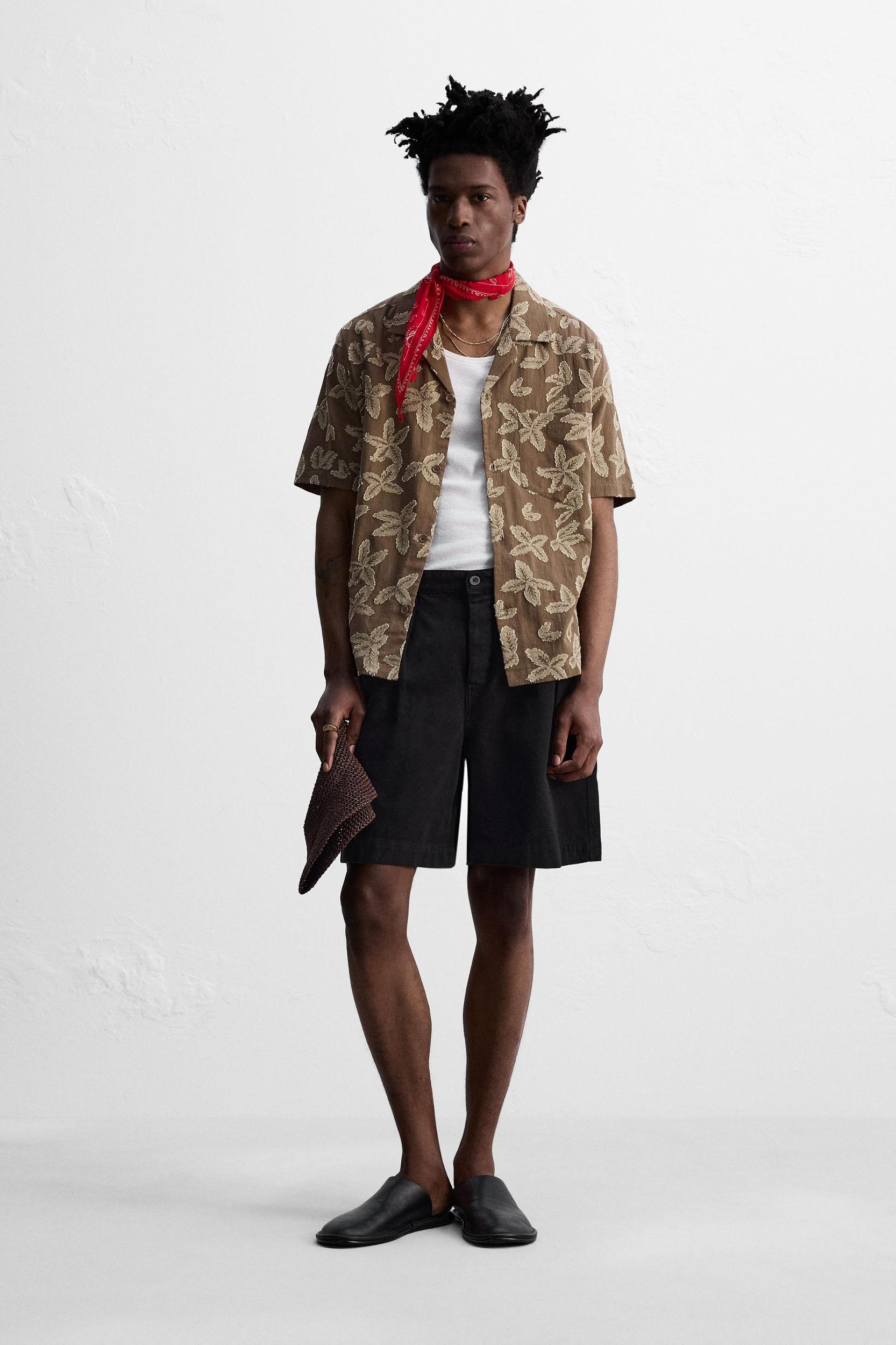 RELAXED FIT PLEATED BERMUDA SHORTS Product Image