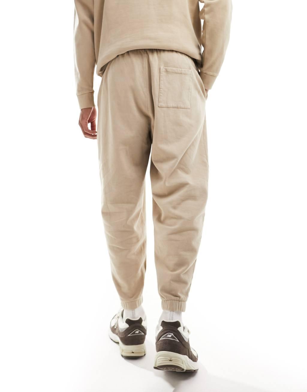 ASOS DESIGN oversized sweatpants in washed beige - part of a set Product Image