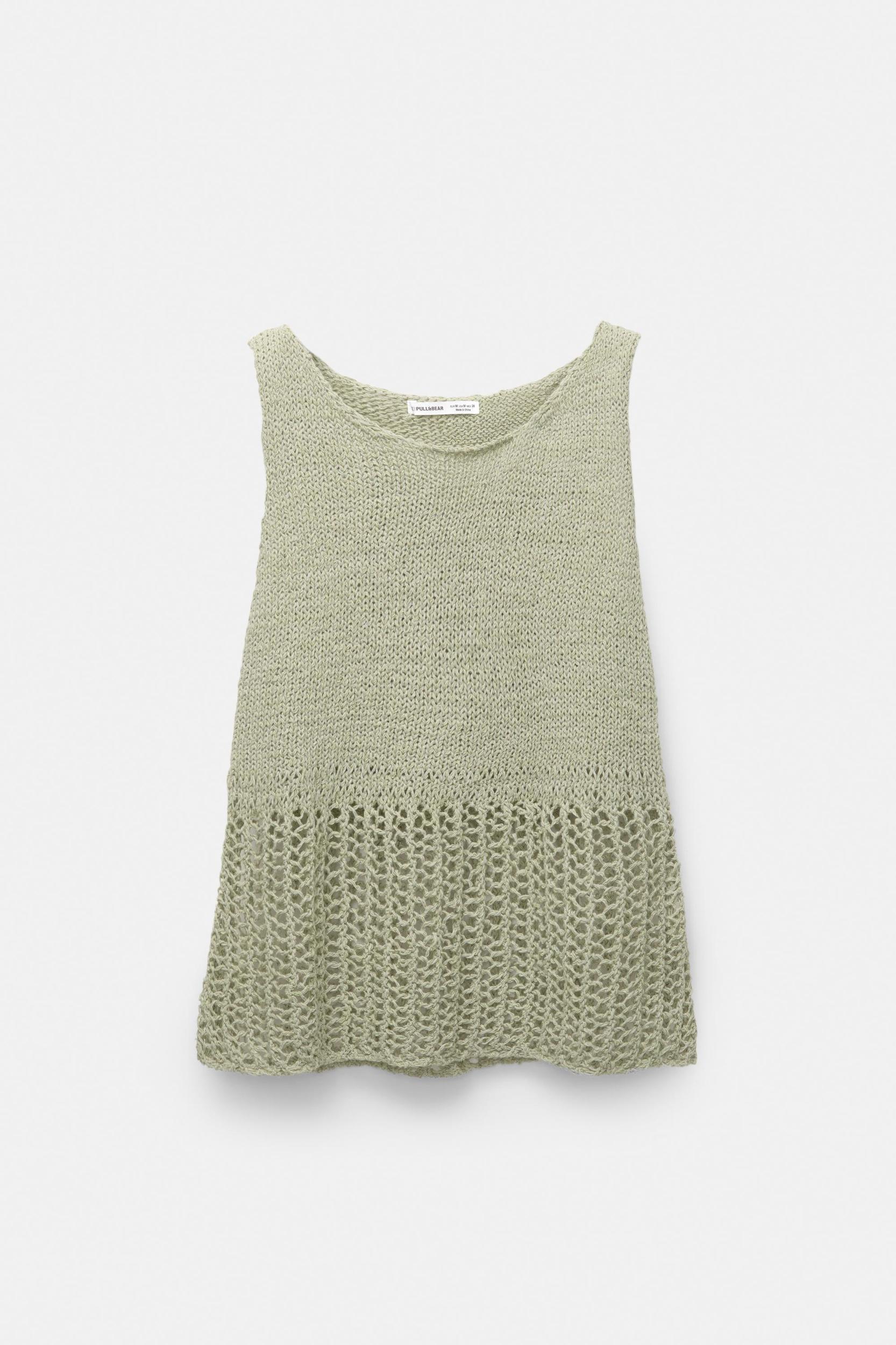 Knit top with an open knit hem Product Image