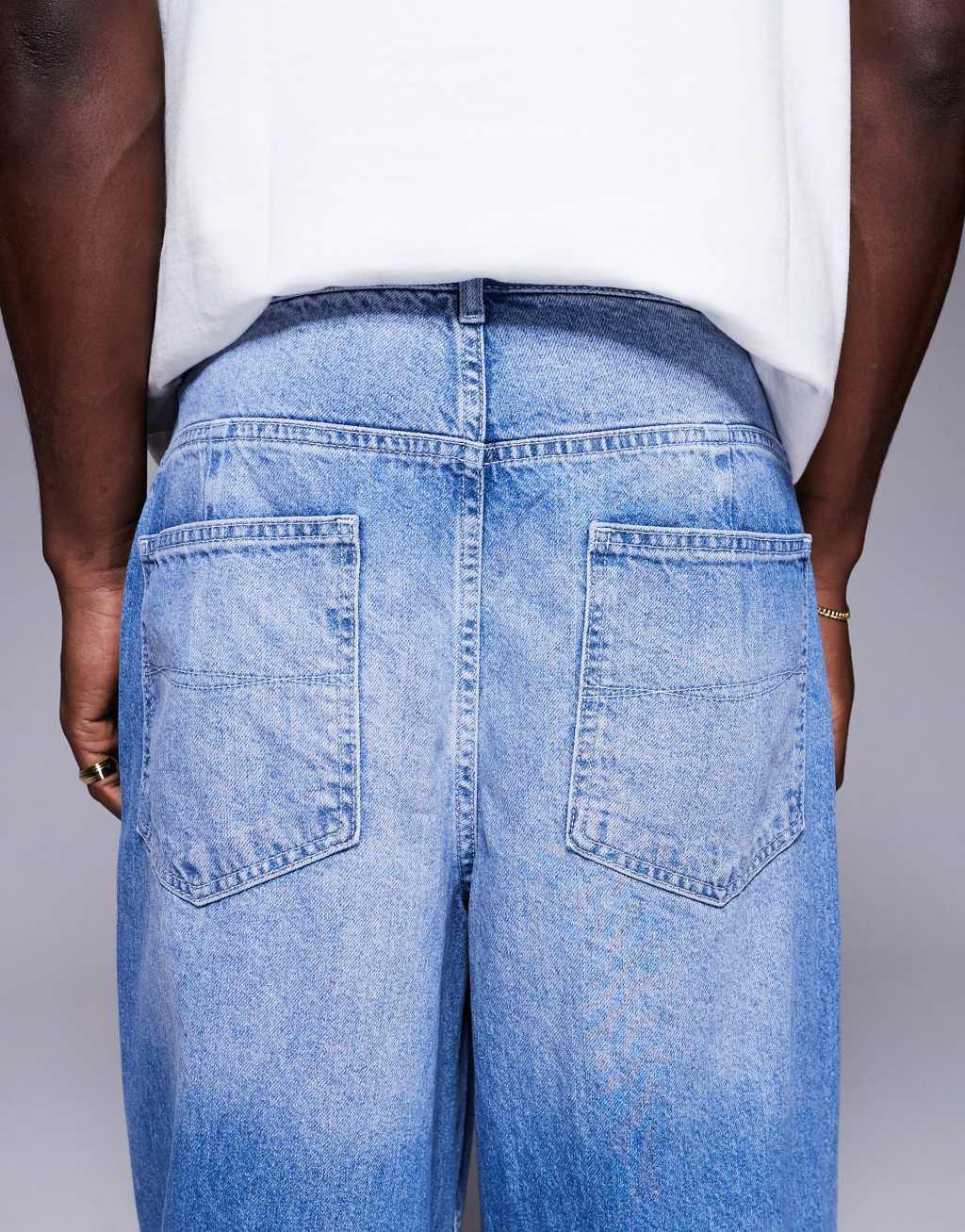 ASOS DESIGN super baggy jeans with carpenter details in light wash Product Image