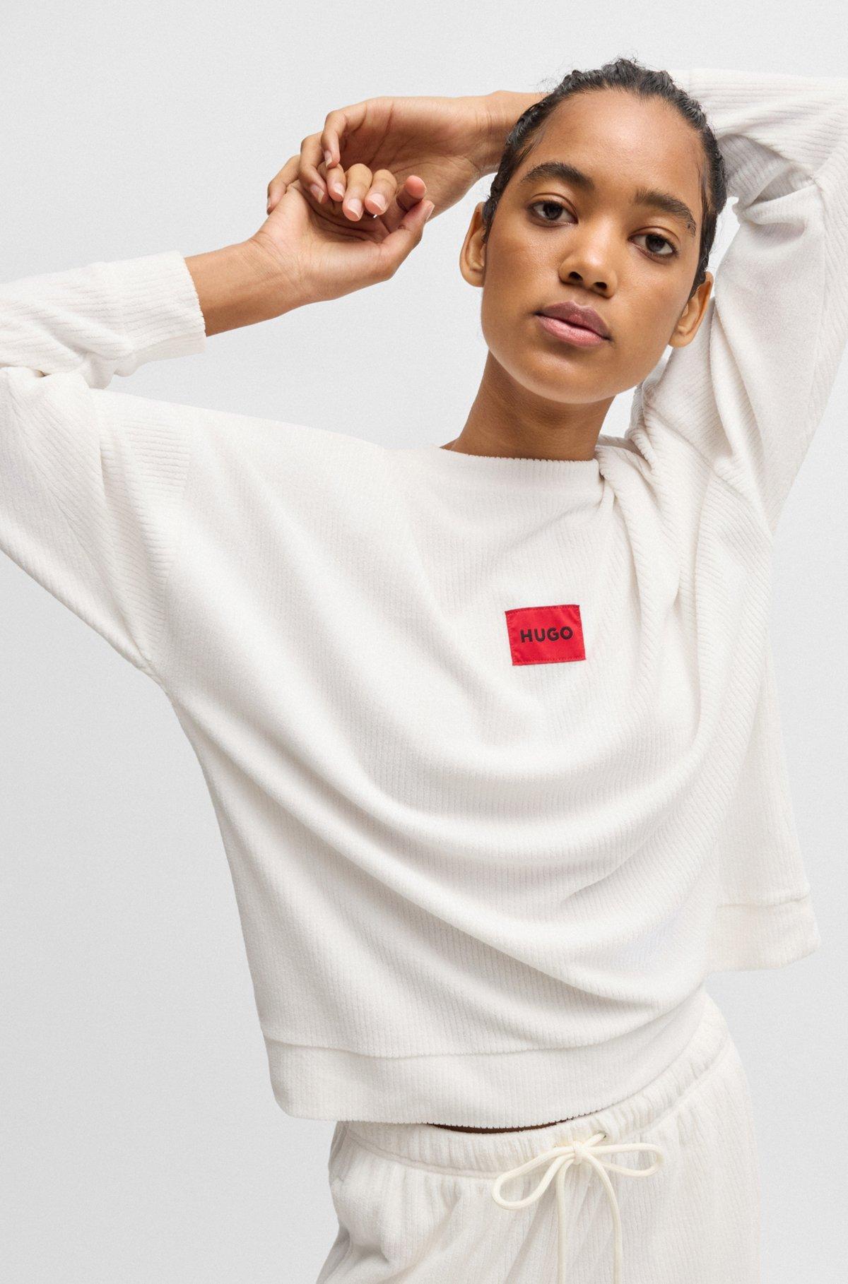 Sweatshirt with red logo label Product Image