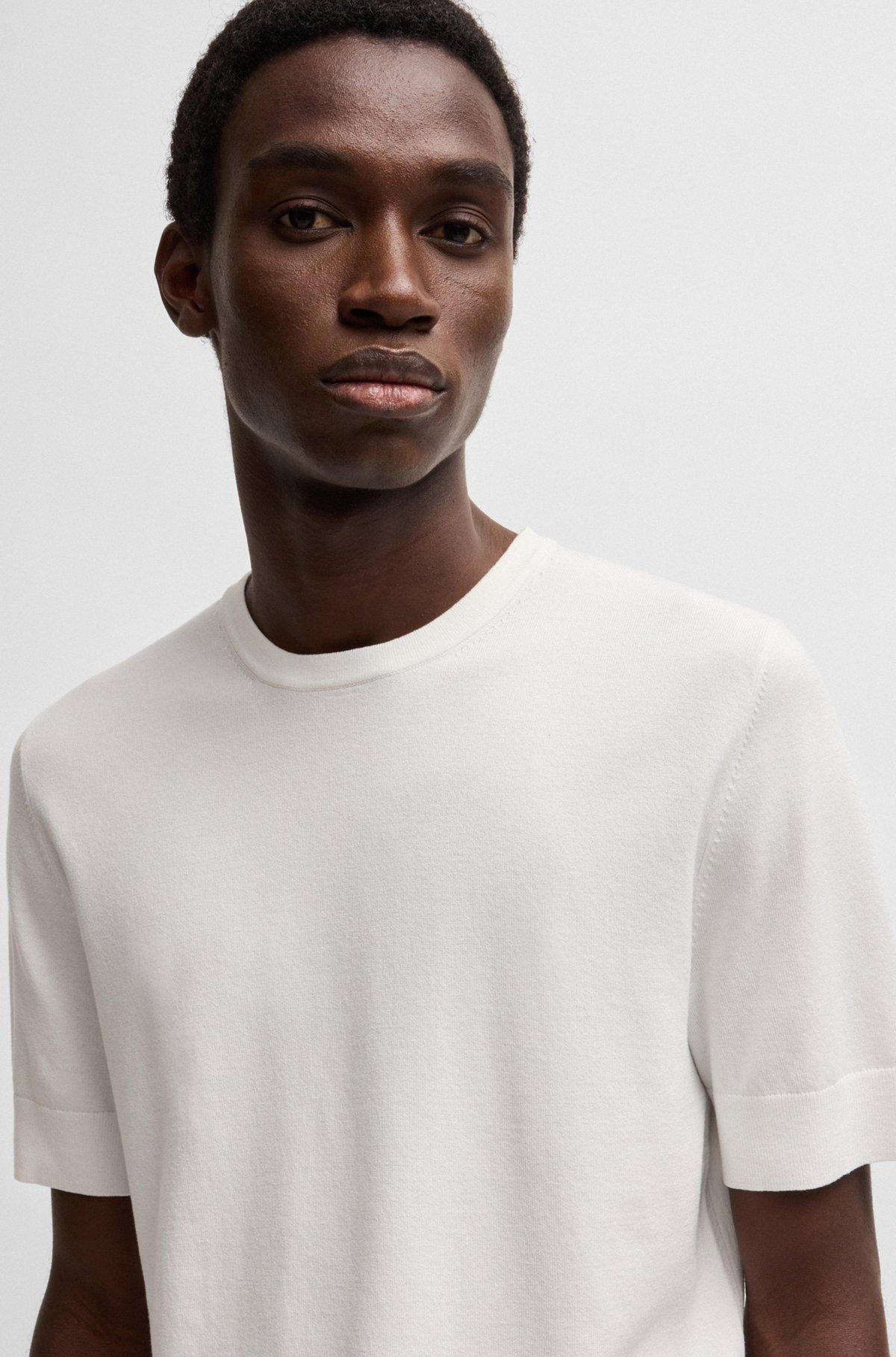 Slim-fit knitted sweater with short sleeves Product Image