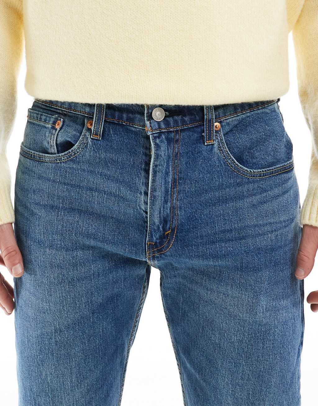 Levi's 502 tapered fit jeans in mid wash Product Image