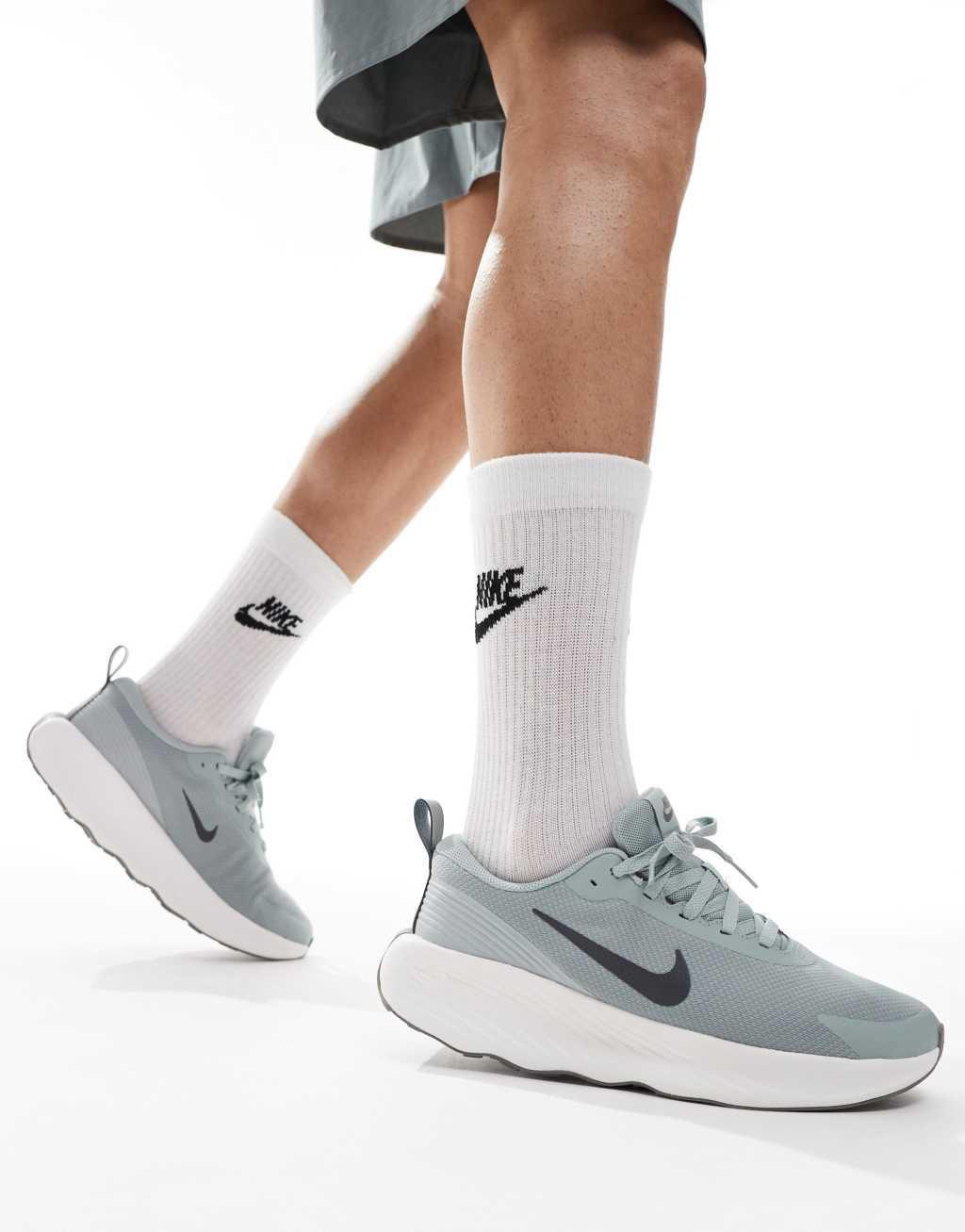 Nike Training Legend Essential 4 sneakers in gray and white Product Image