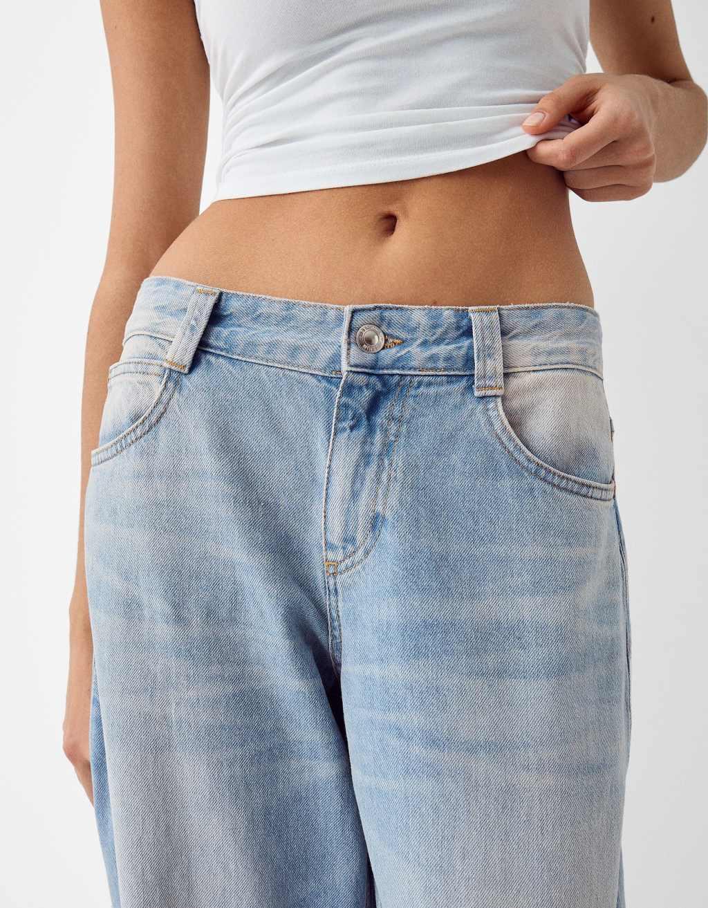 Bershka slouchy baggy jeans in light dirty wash blue Product Image