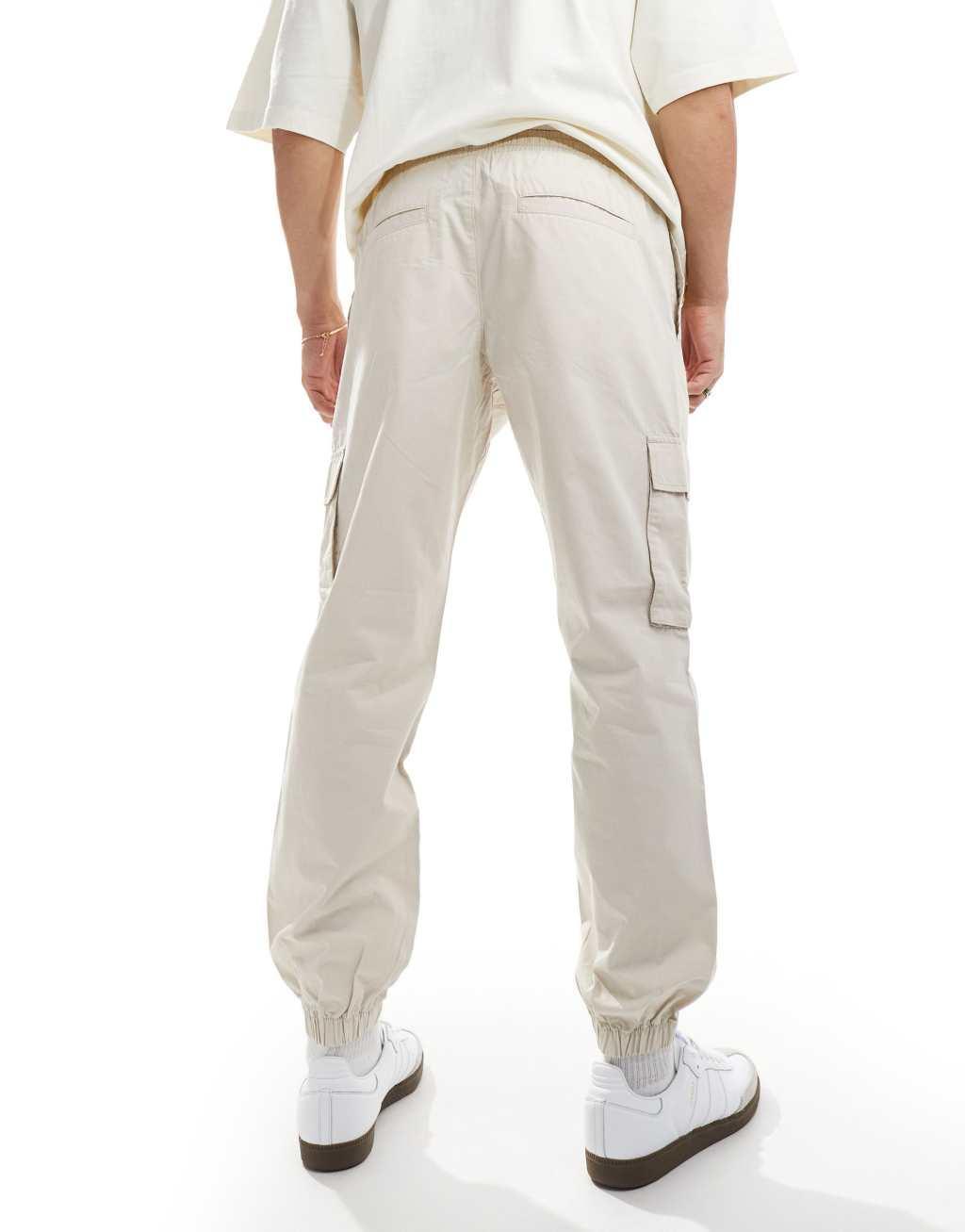 ASOS DESIGN tapered pull on pants in stone Product Image