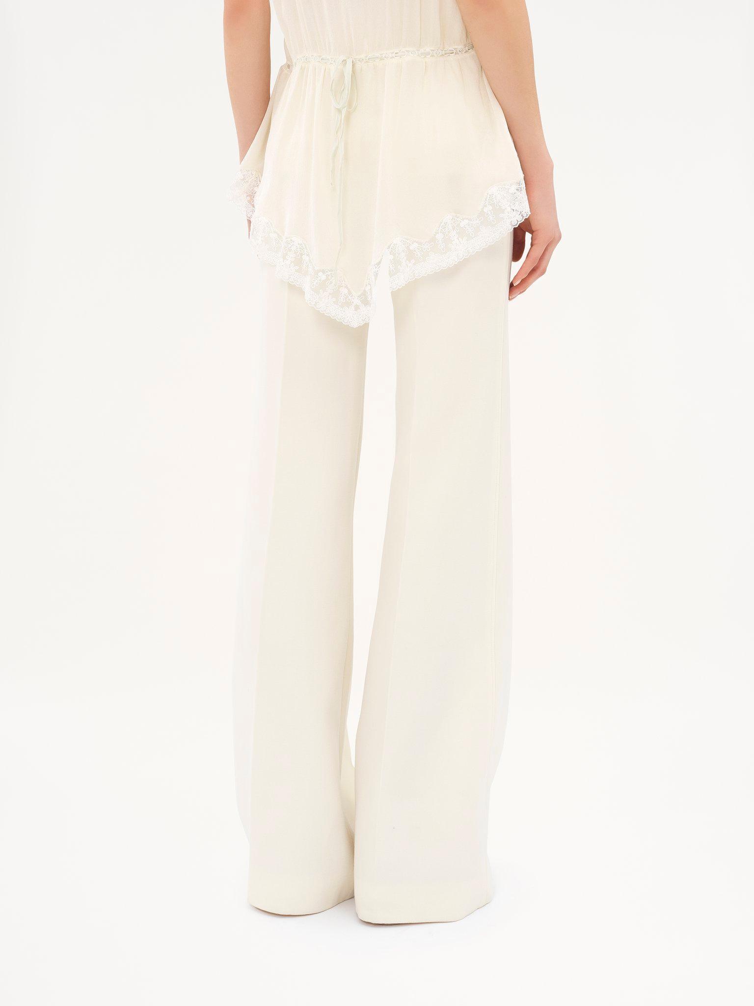 High-rise flared pants in wool grain de poudre Product Image
