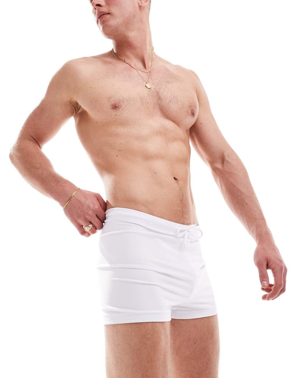 ASOS DESIGN stretch swim trunks in white Product Image