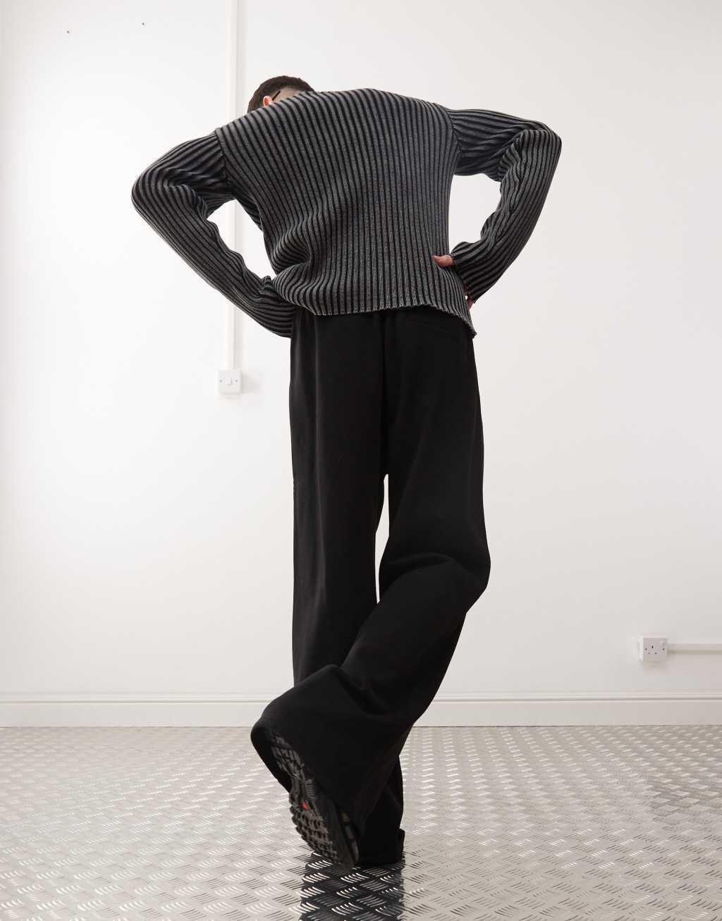 Weekday Wind super wide leg sweatpants with front pleats in black Product Image