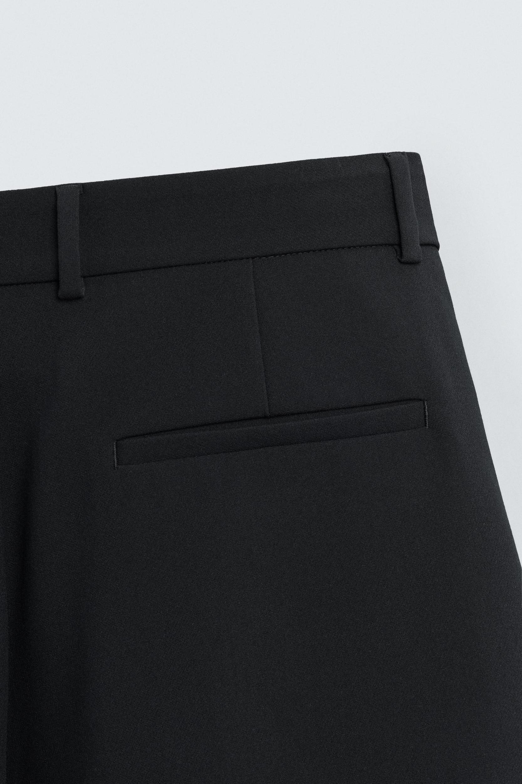 RELAXED FIT PLEATED PANTS Product Image