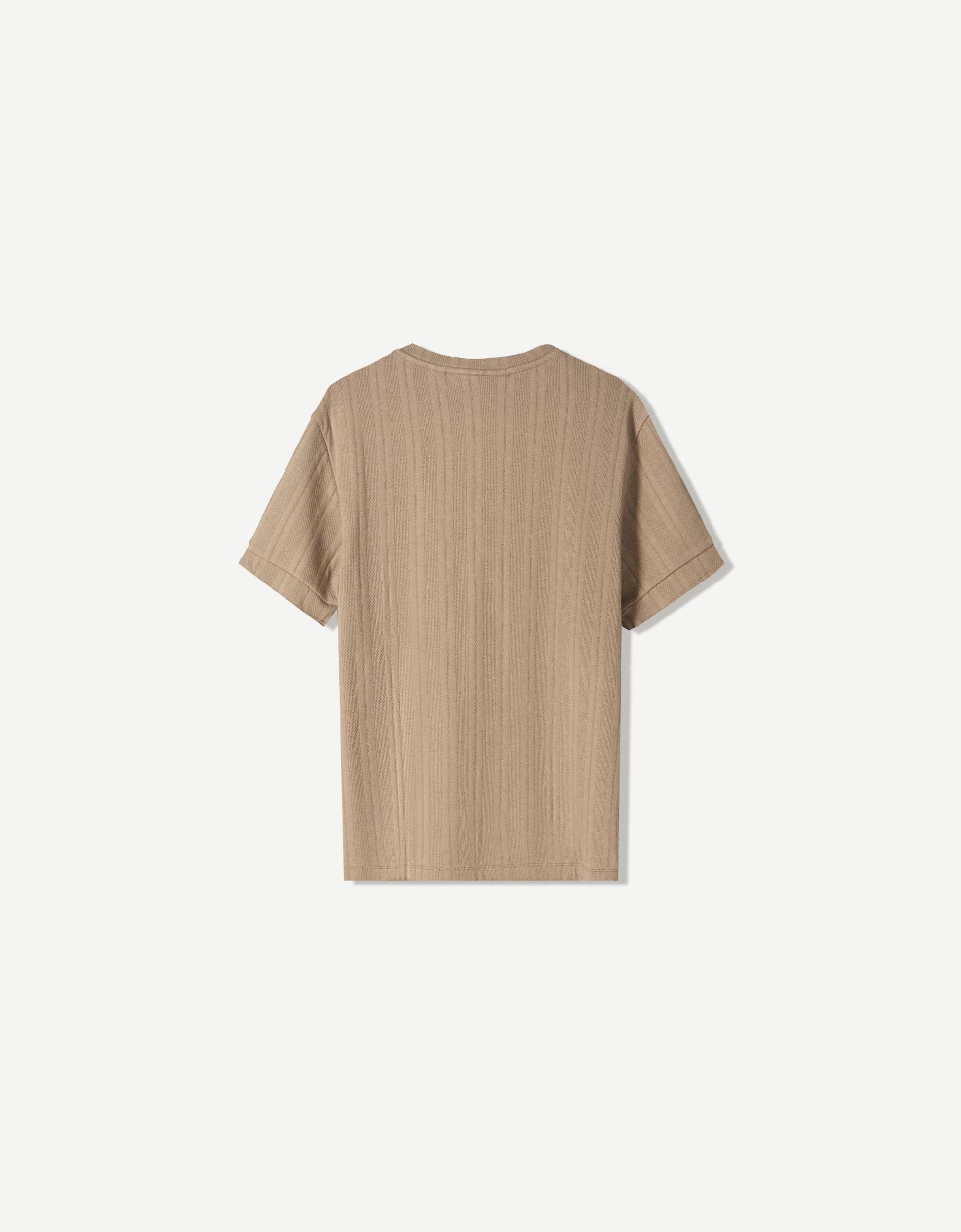 Textured short sleeve T-shirt with buttons Product Image