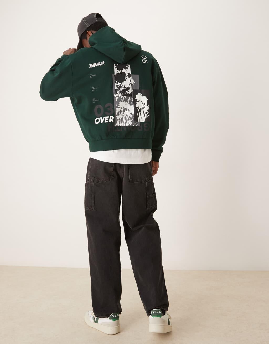 ASOS DESIGN boxy oversized hoodie with floral back print in dark green Product Image