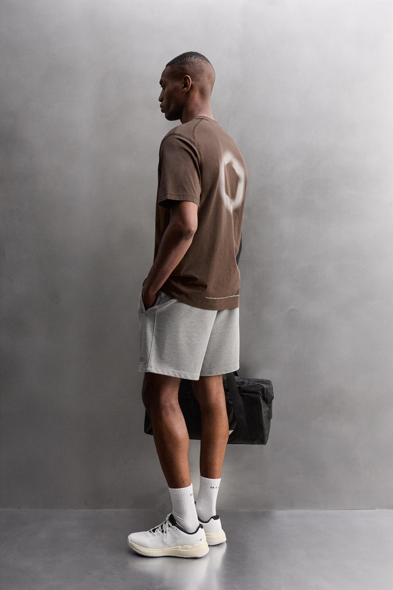 RUNNING GRAPHIC PRINT T-SHIRT Product Image