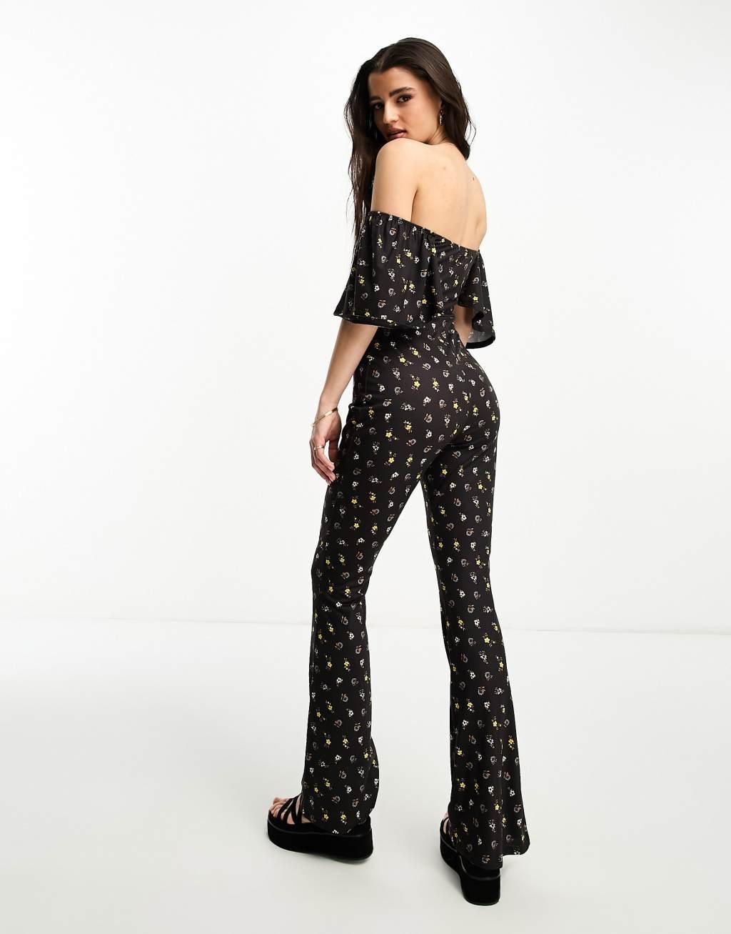 ASOS DESIGN jersey fluted sleeve jumpsuit with flare leg Product Image