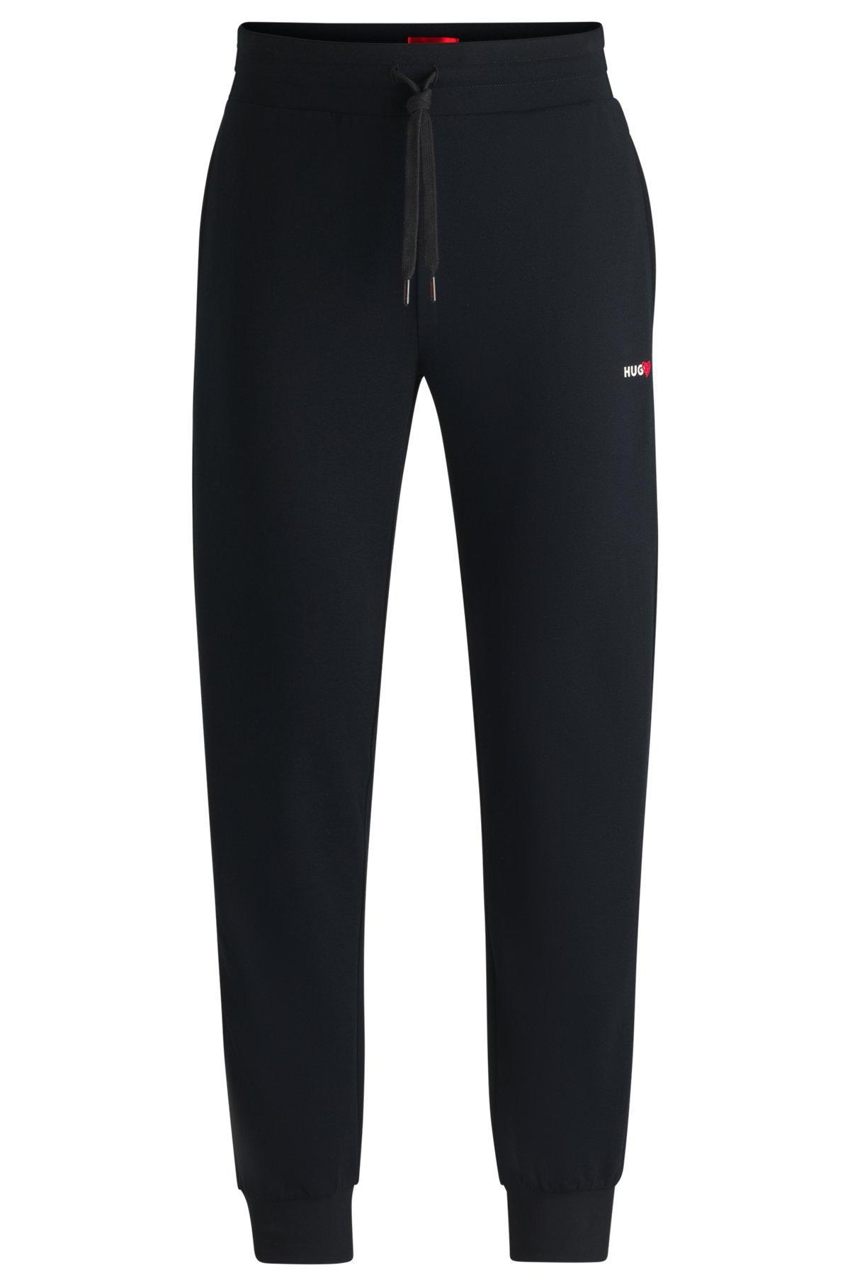  tracksuit bottoms with heart logo Product Image