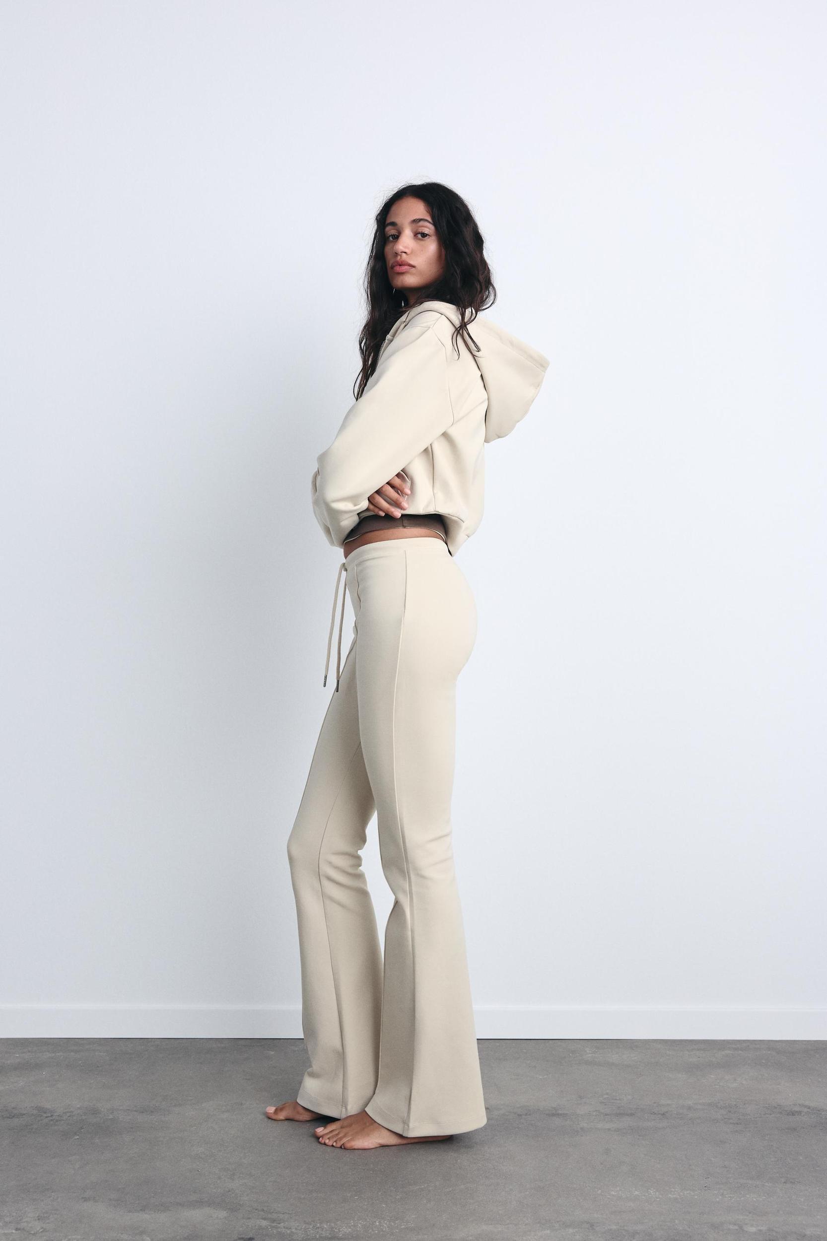 FLARE INTERLOCK PANTS WITH SEAMS Product Image