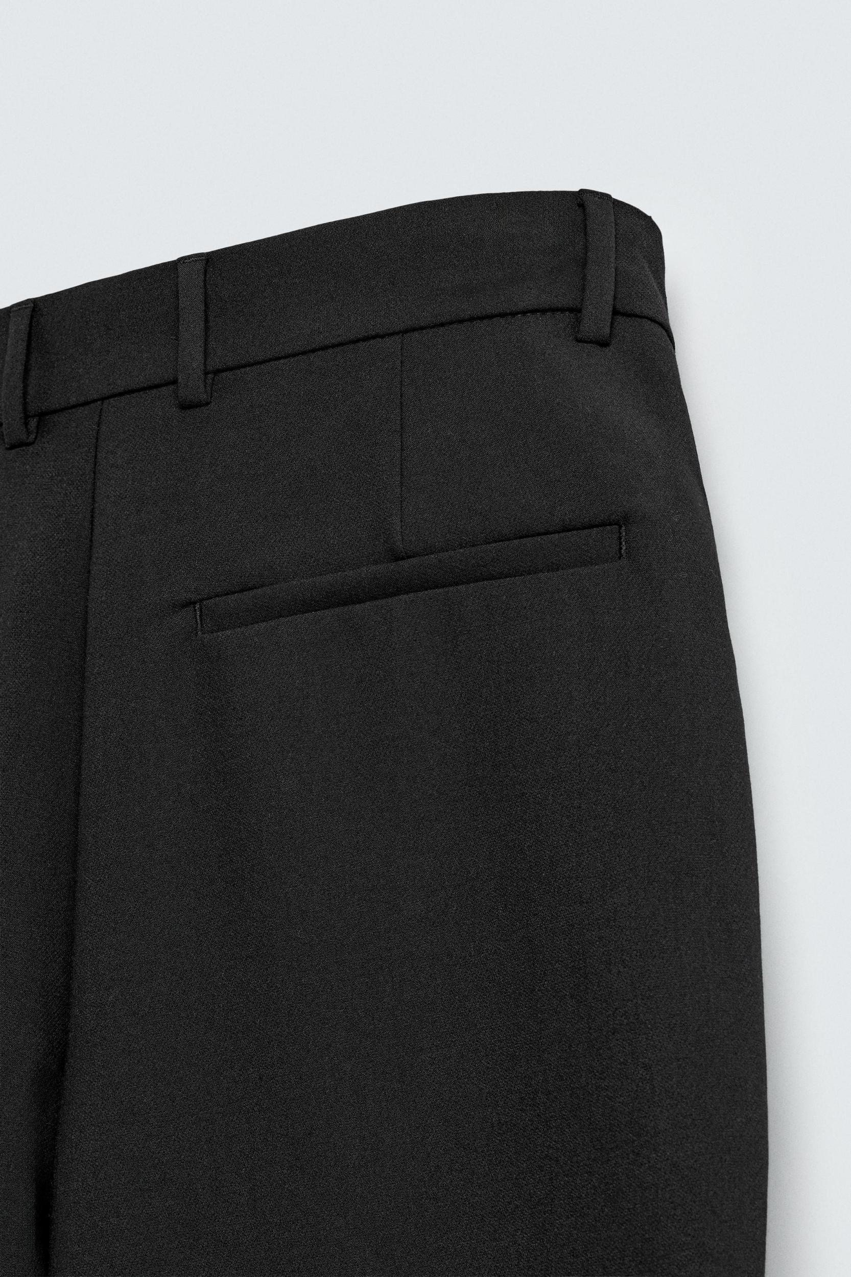 RELAXED FIT PLEATED PANTS Product Image