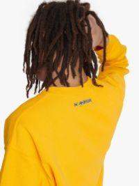 JW ANDERSON X QUEER SWEATSHIRT WITH TEXT PRINT in gold | JW Anderson US  Product Image