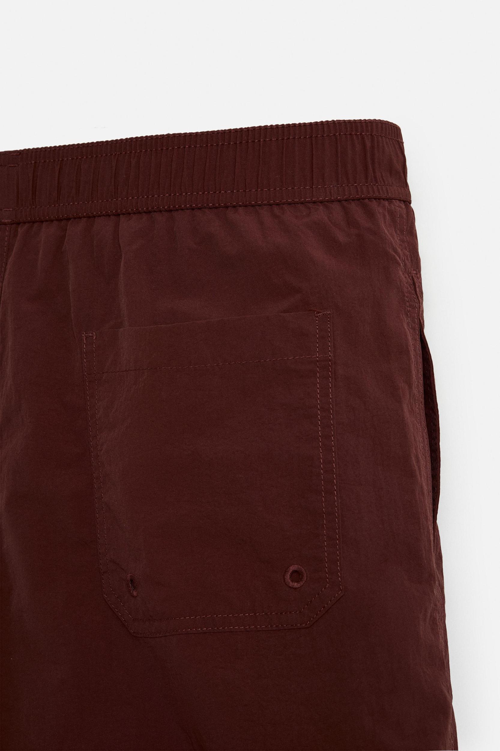 DRAWSTRING SWIM TRUNKS Product Image