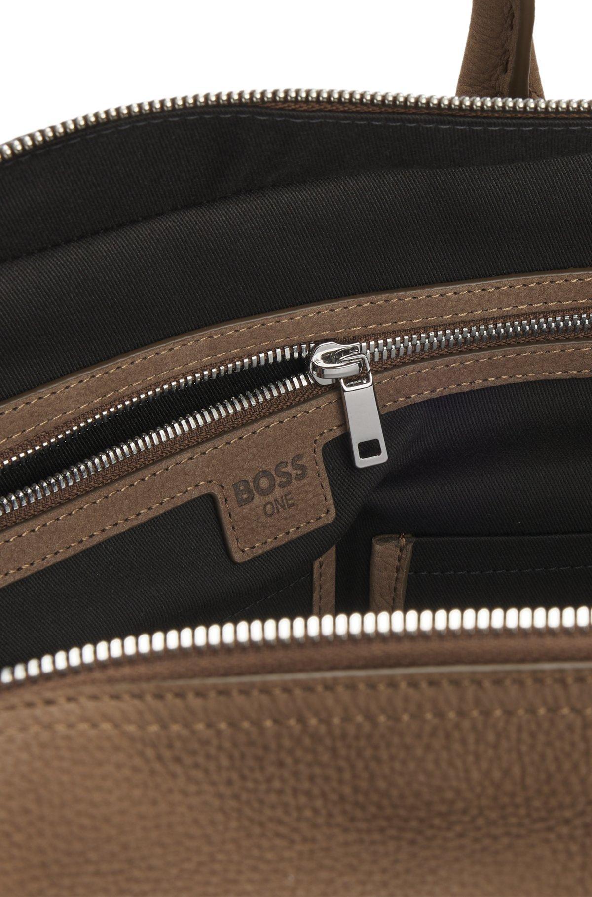 Grained-leather holdall with embossed logo Product Image