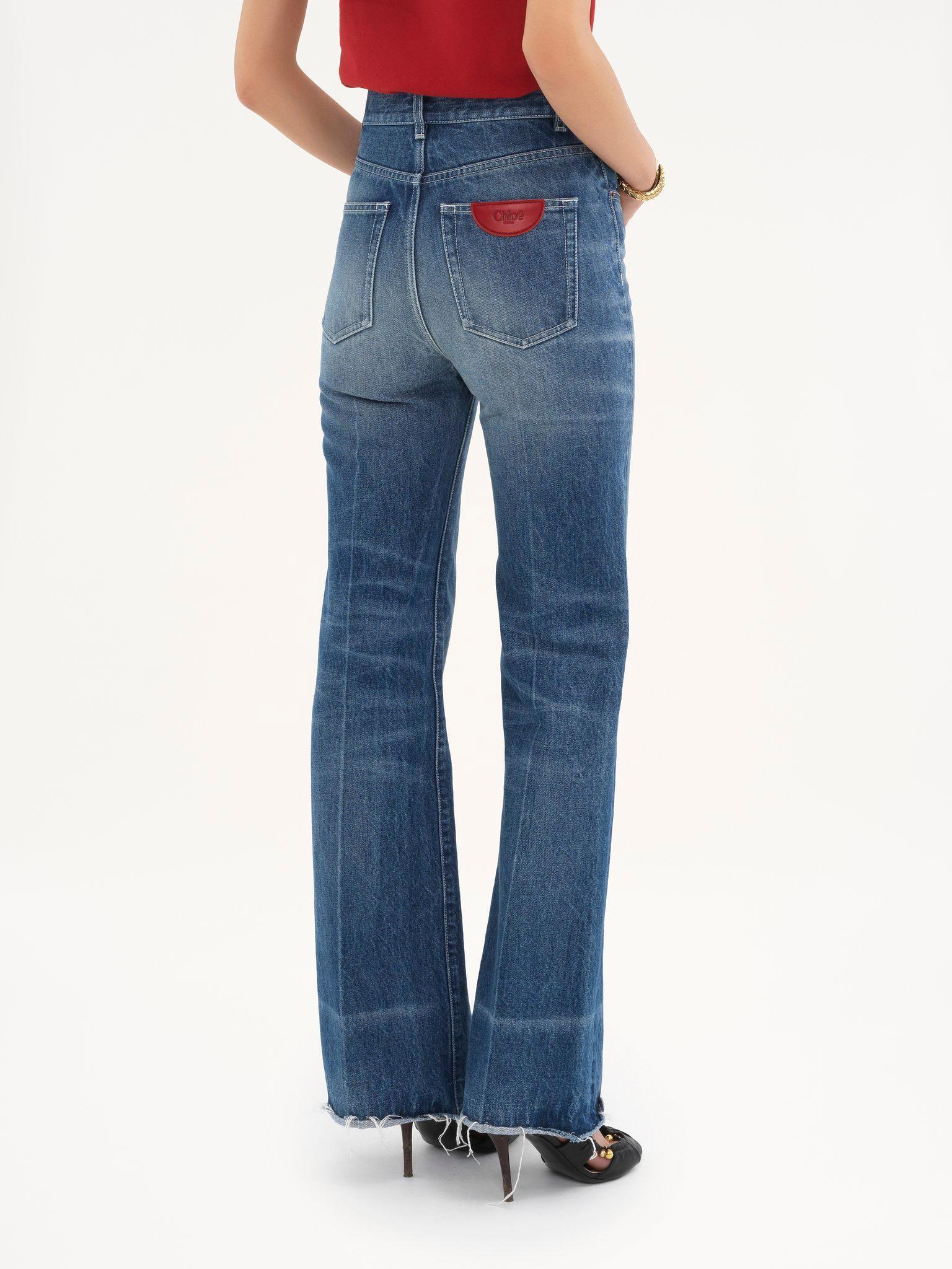 High-rise bootcut jeans in denim Product Image