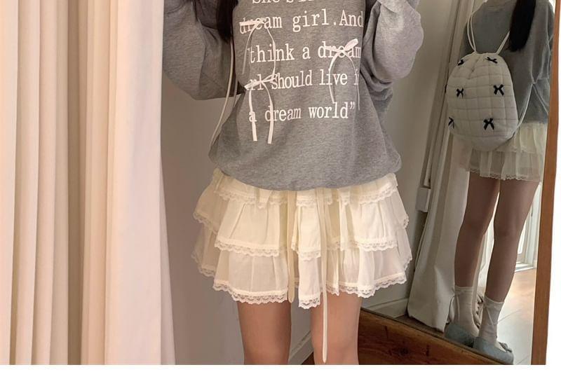 Round Neck Lettering Bow Cutout Sweatshirt Product Image