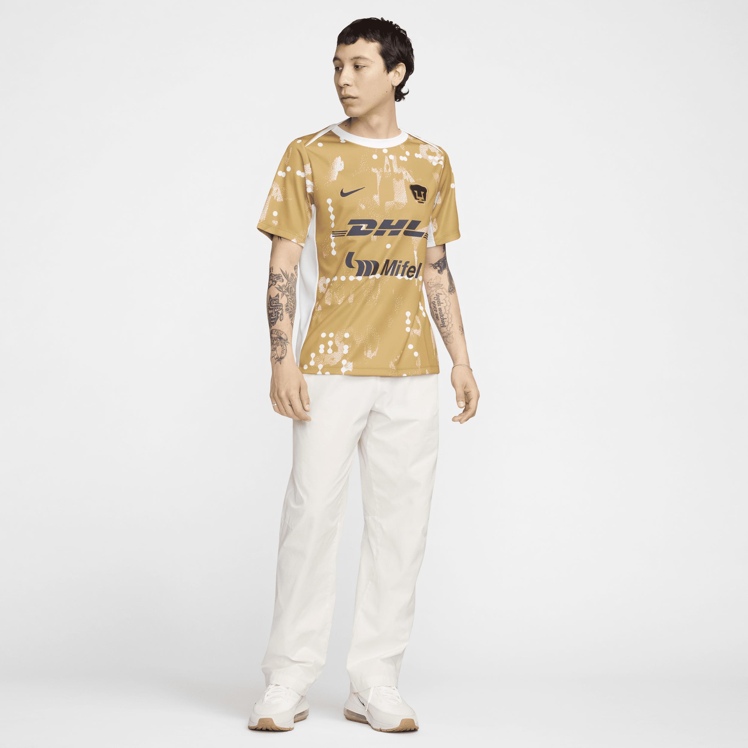 Pumas UNAM Academy Pro Nike Mens Dri-FIT Soccer Short-Sleeve Pre-Match Top | FN9660-714 Product Image