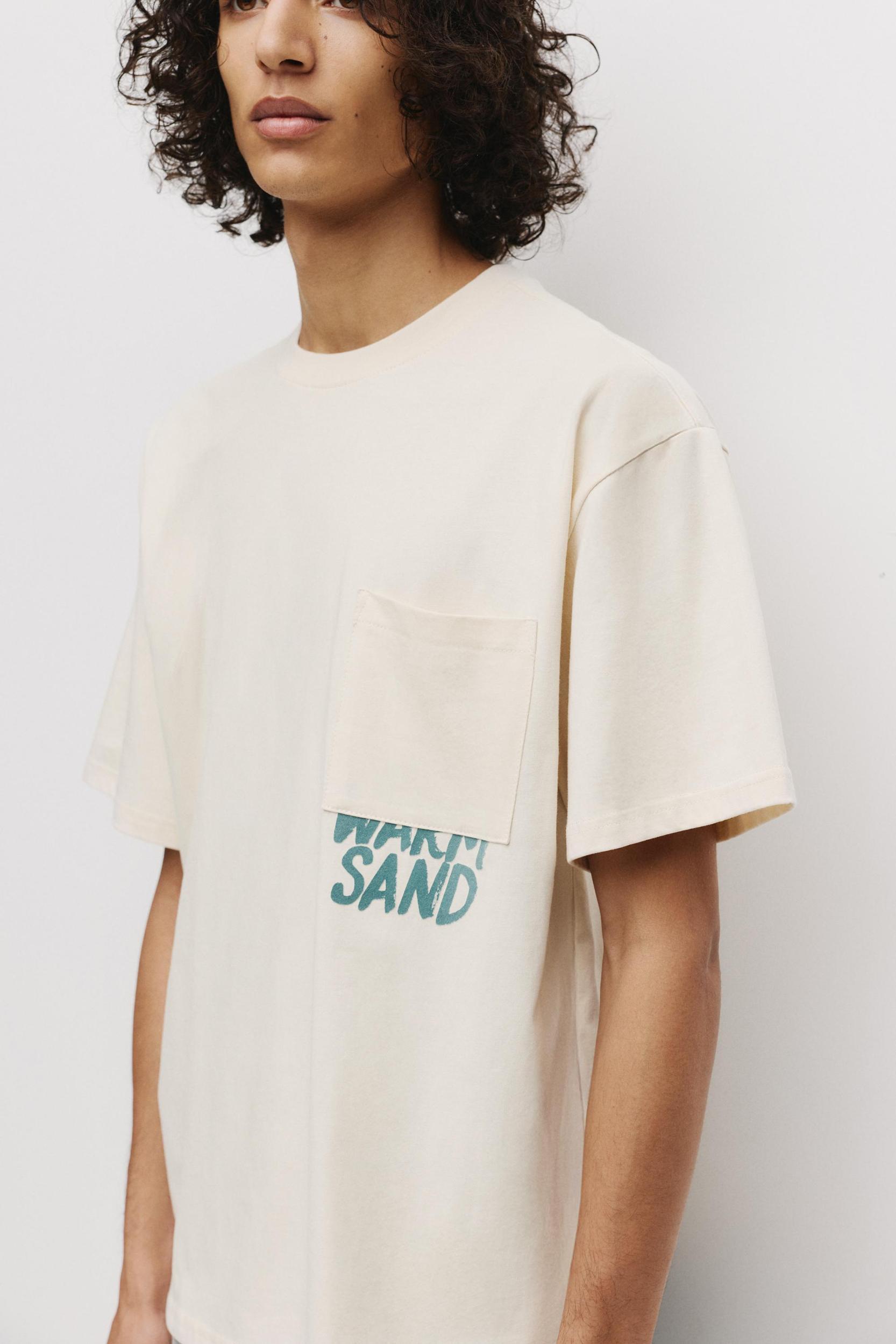 Beige T-shirt with pocket Product Image