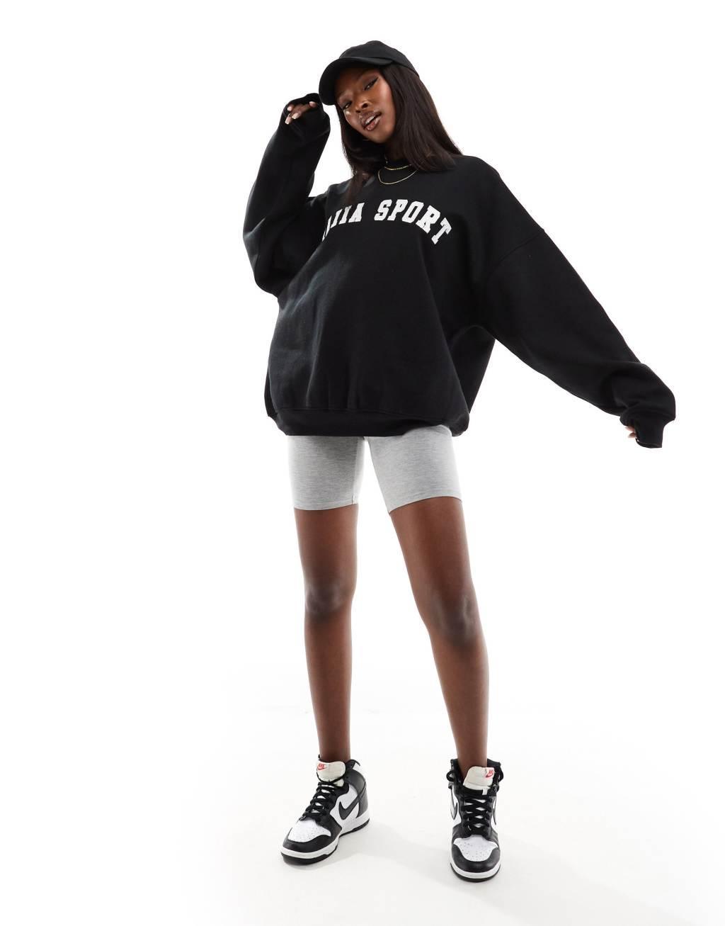 Kaiia sport logo oversized sweatshirt in black Product Image