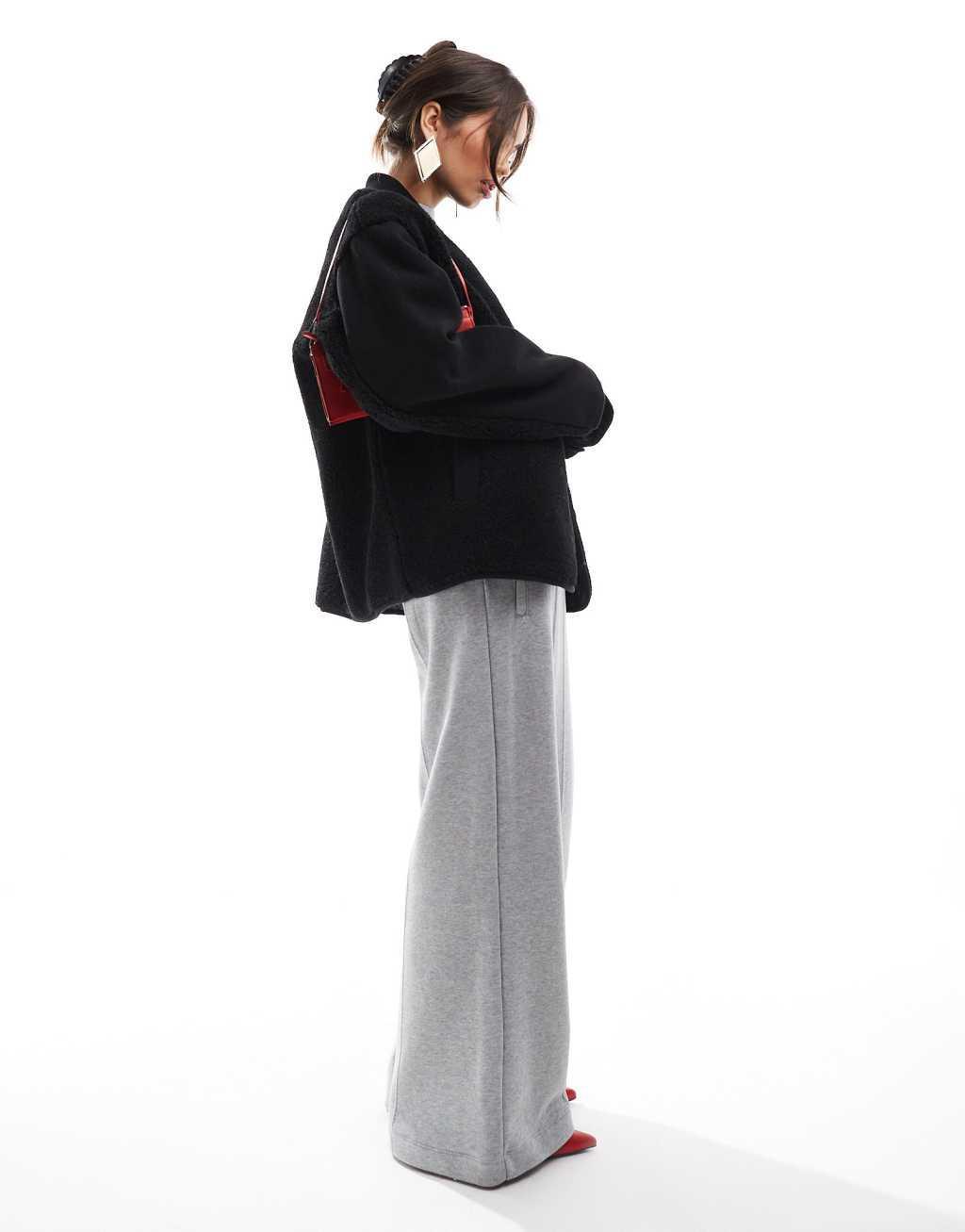 ASOS DESIGN spliced teddy formal jacket in black Product Image