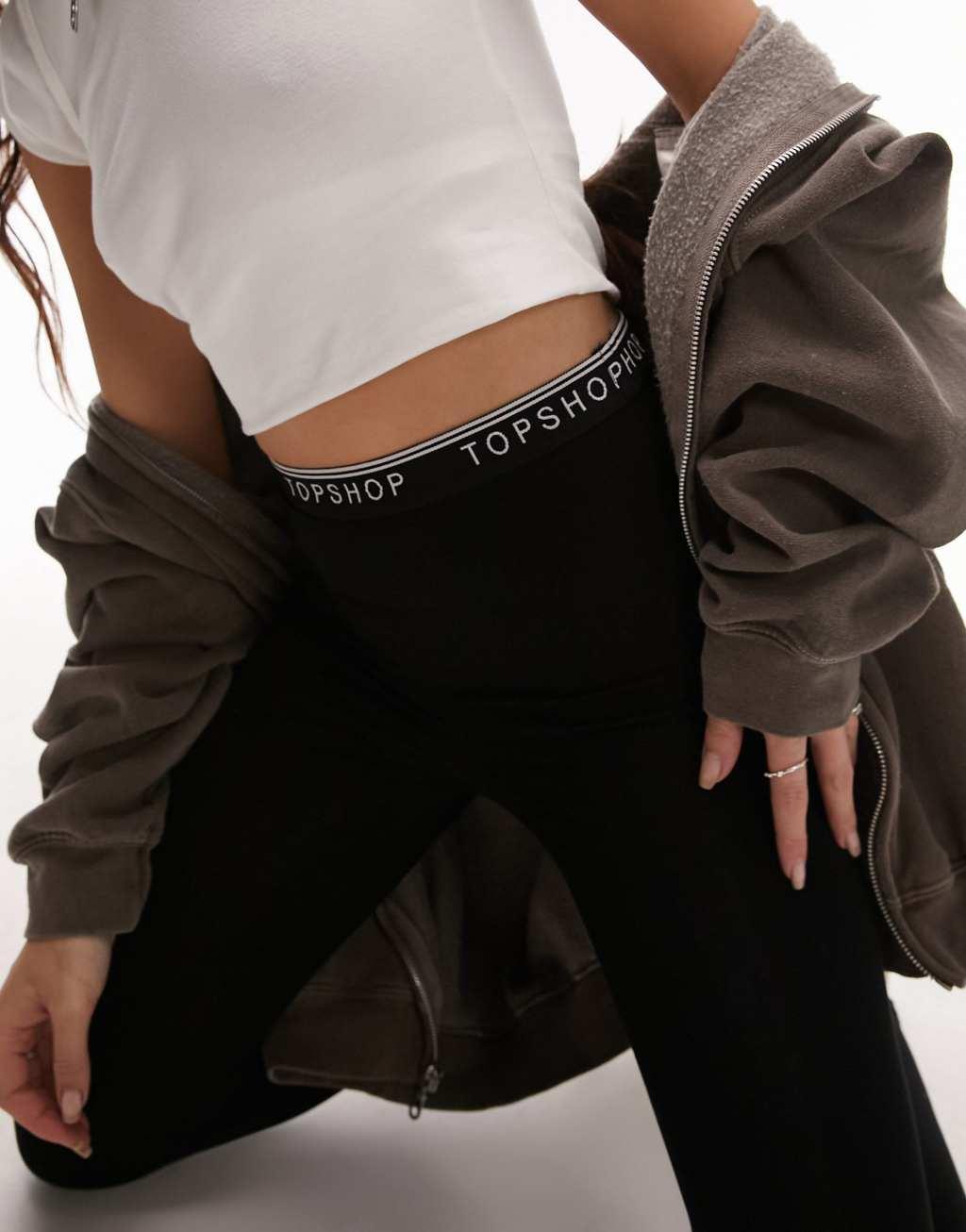 Topshop branded elasticized leggings in black Product Image