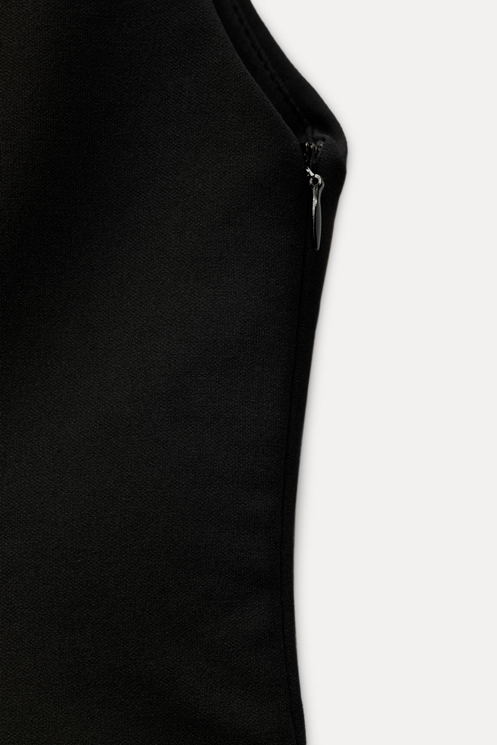 STRETCHY PEPLUM TOP Product Image