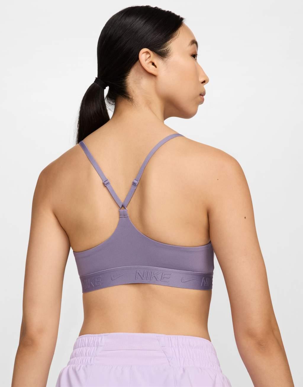 Nike Training Indy Dri-FIT light support sports bra in purple  Product Image