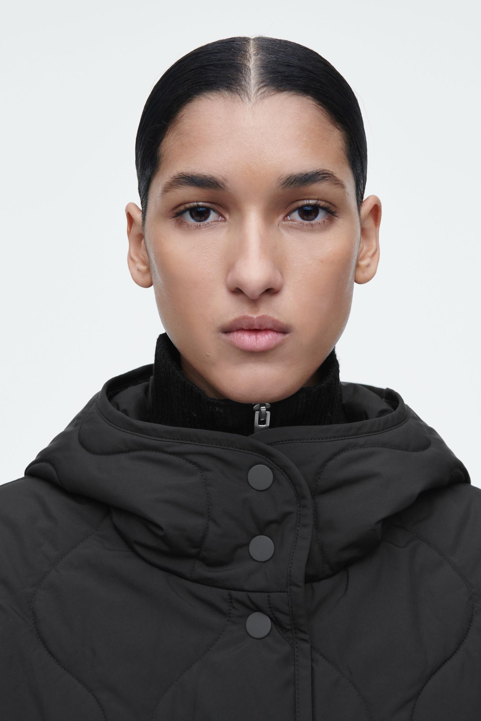 QUILTED HOODED FUNNEL-NECK JACKET Product Image