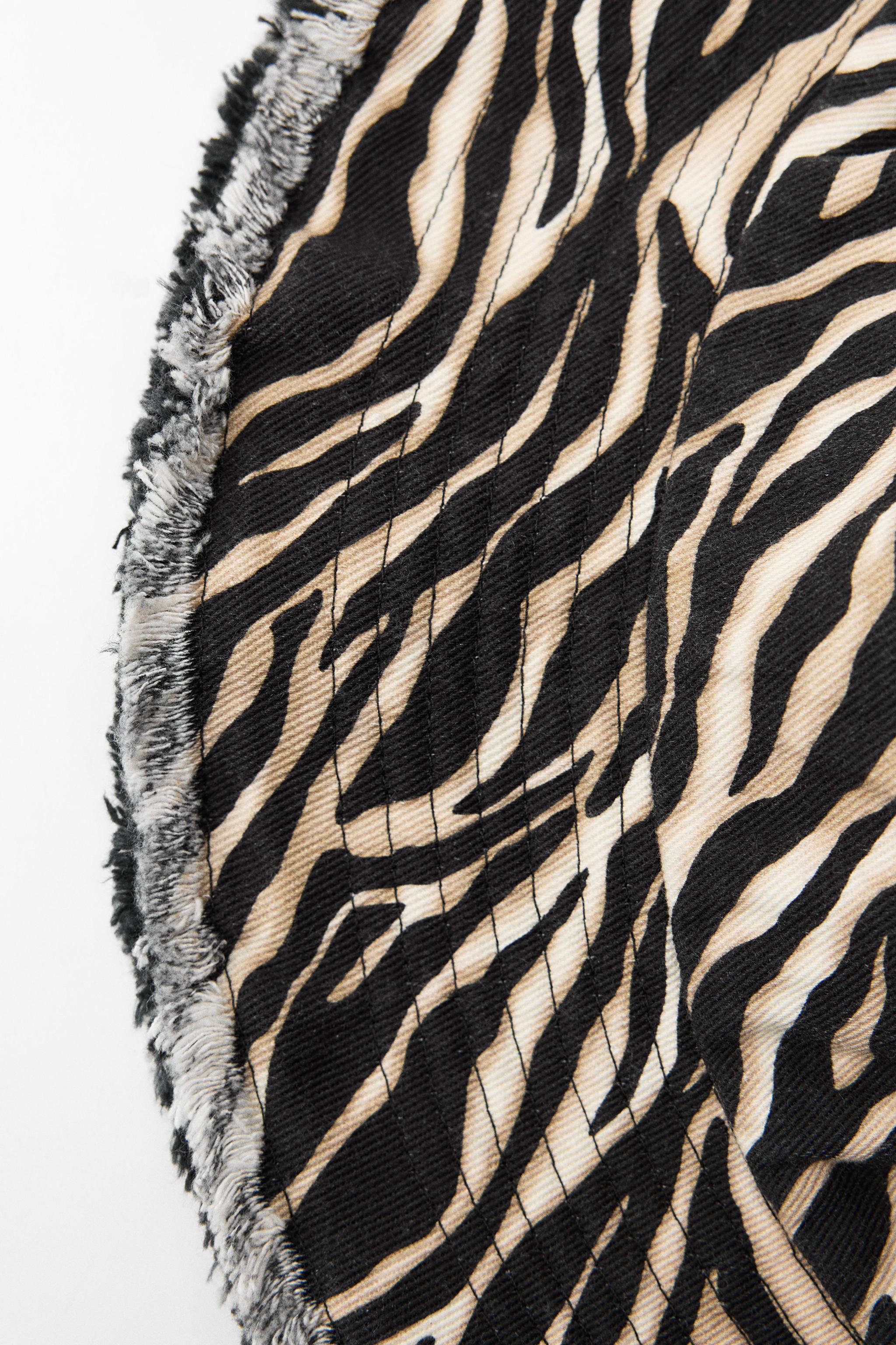 ANIMAL PRINT BUCKET HAT Product Image