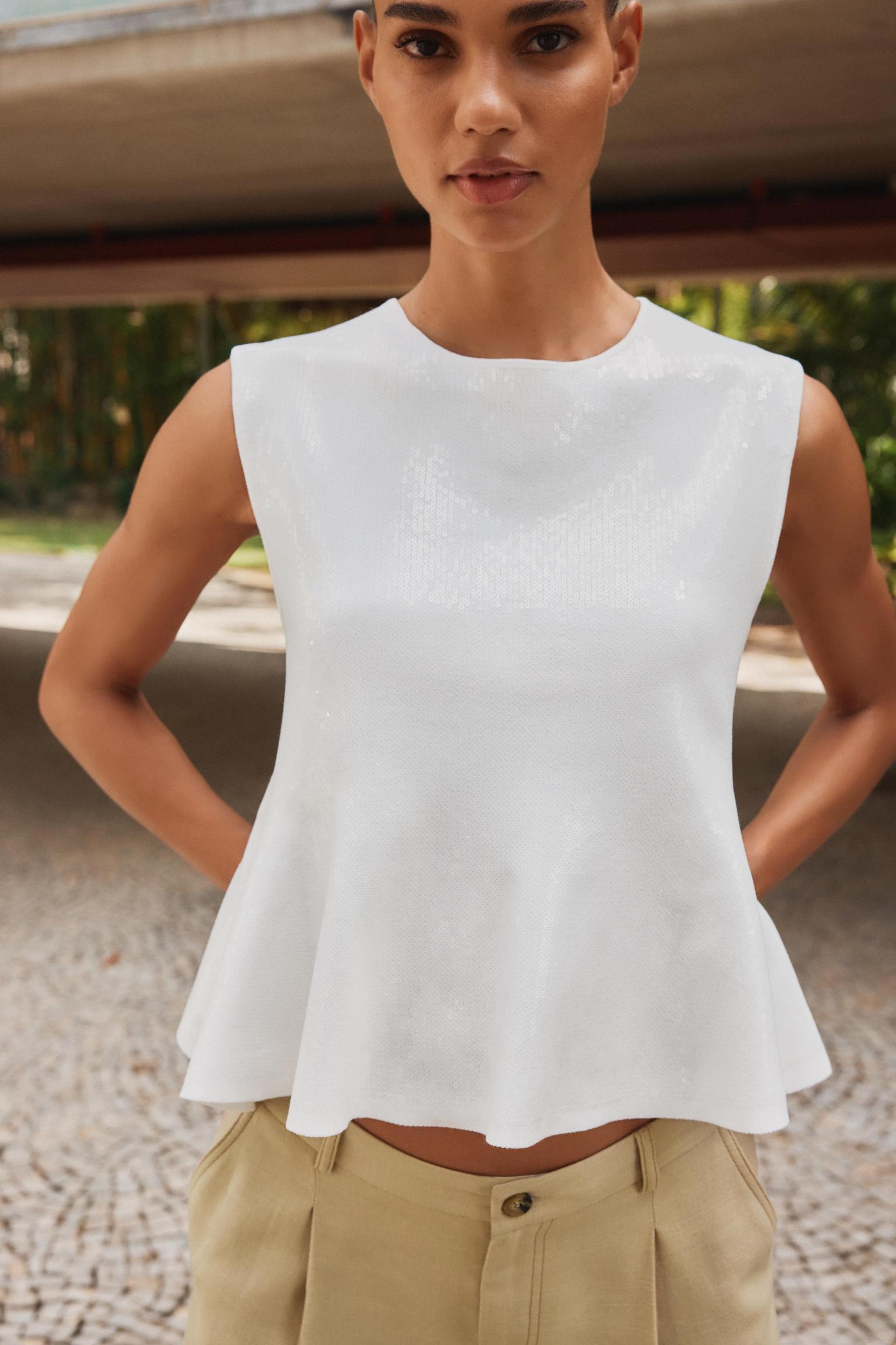 SEQUIN KNIT PEPLUM TOP Product Image