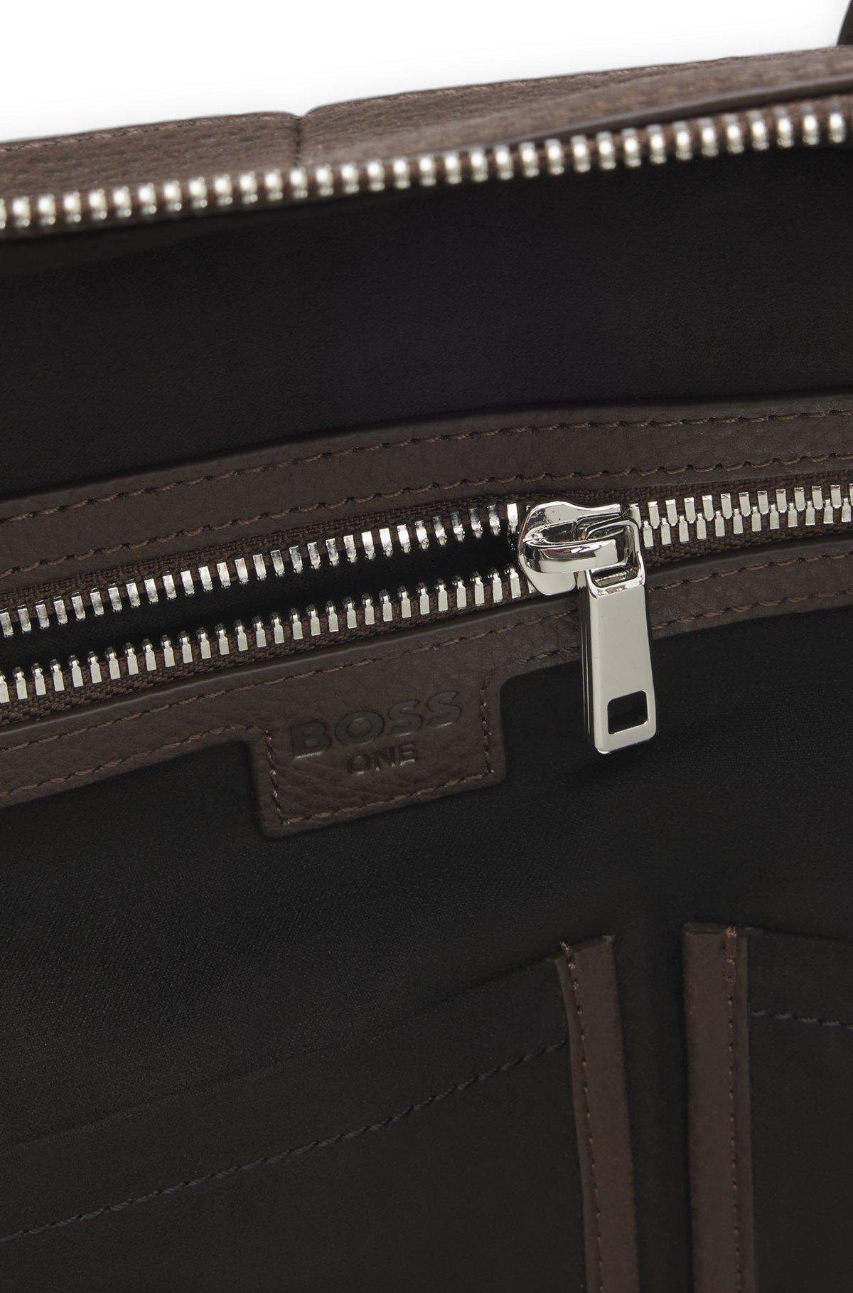 Grained-leather holdall with embossed logo Product Image