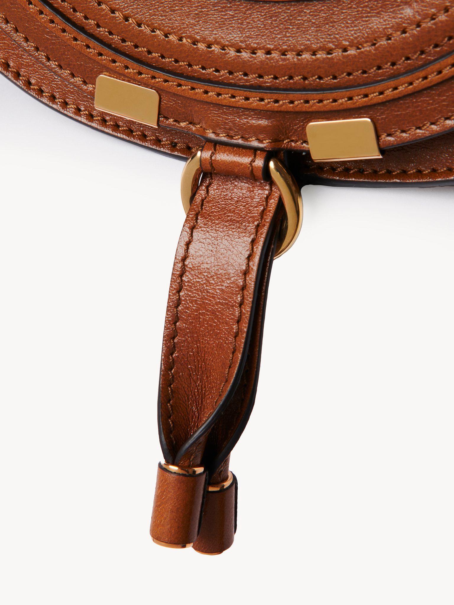 Small Marcie saddle bag in shiny leather Product Image