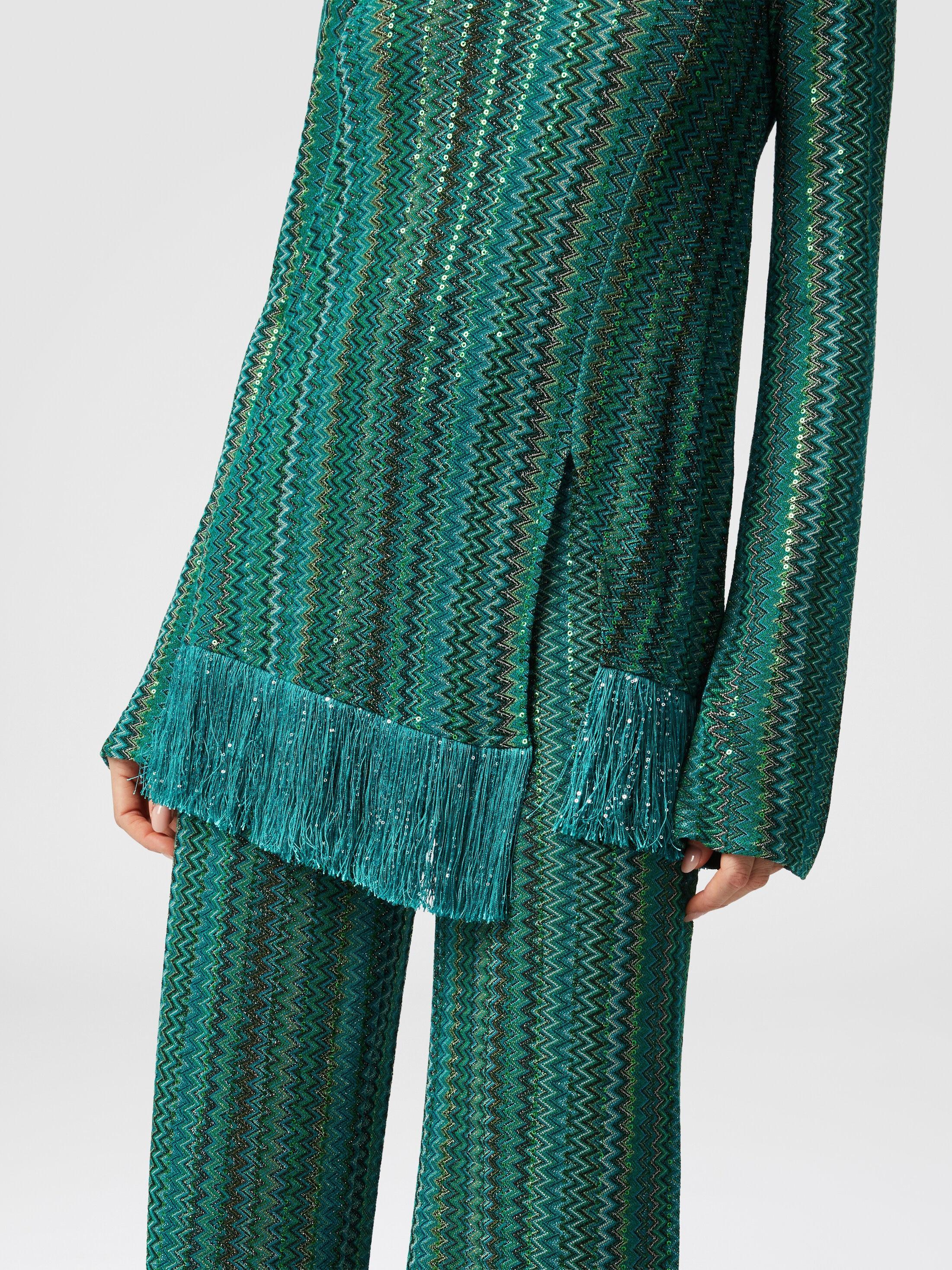 Zig zag sweater with sequins and asymmetrical hem with fringes Product Image