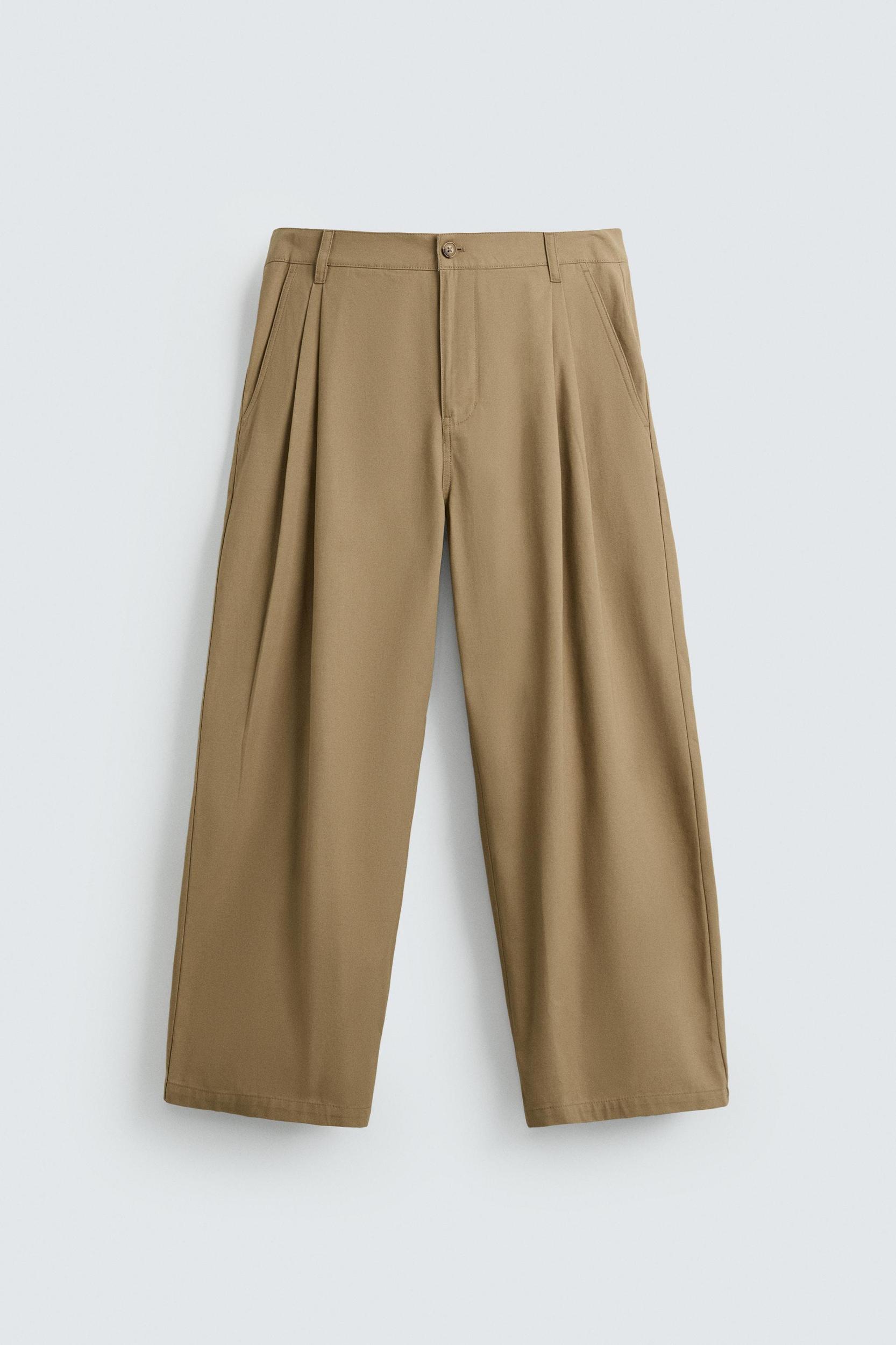 PLEATED WIDE FIT PANTS Product Image