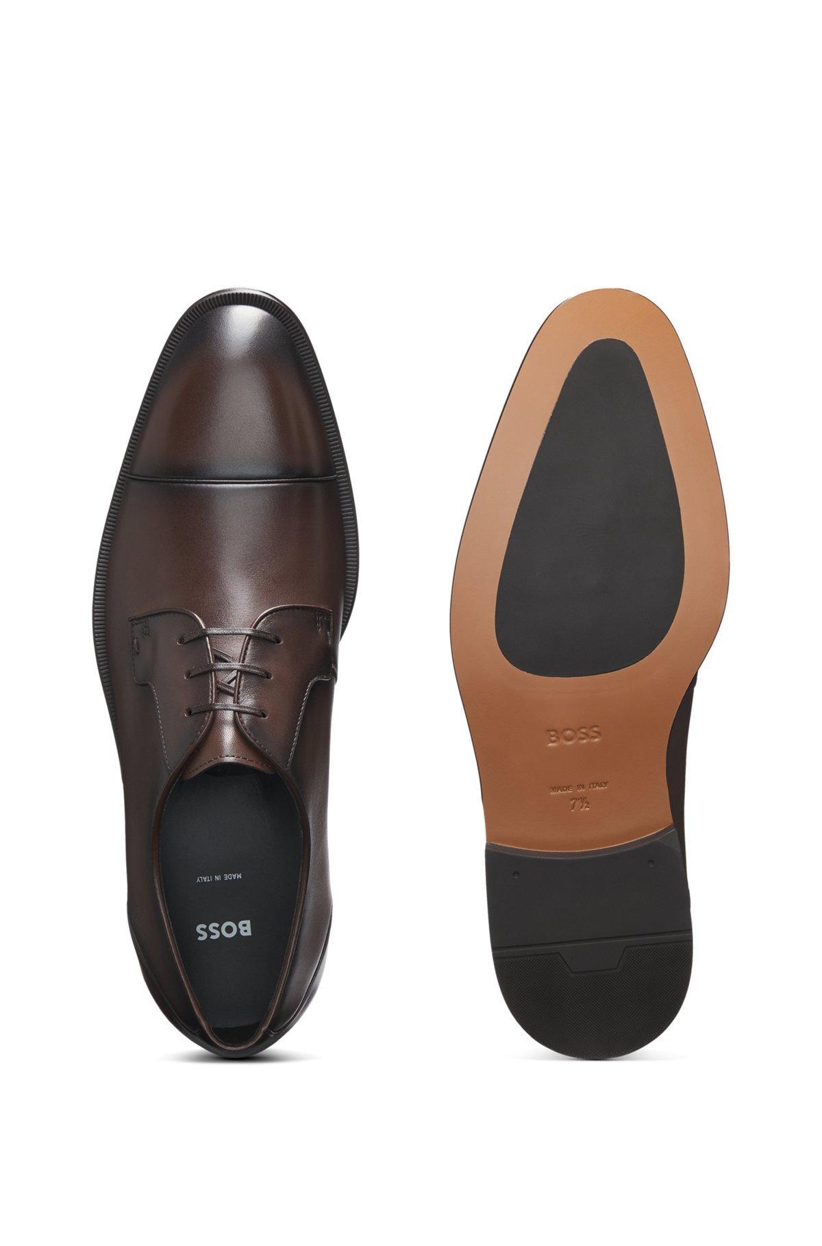 Cap-toe Derby shoes in leather Product Image