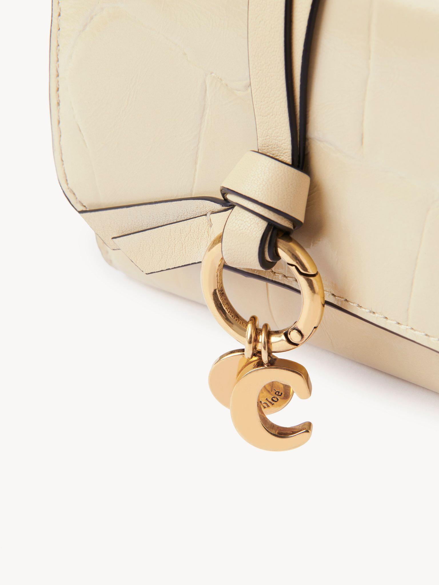 Small Alphabet tri-fold in croco-effect leather Product Image