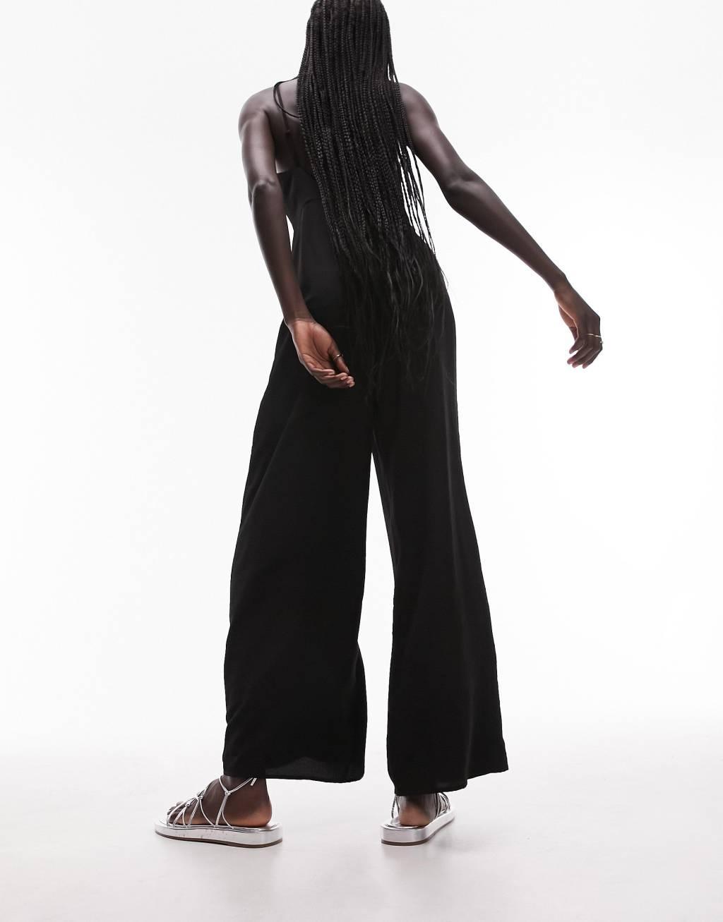 Topshop printed lace-up jumpsuit in black Product Image