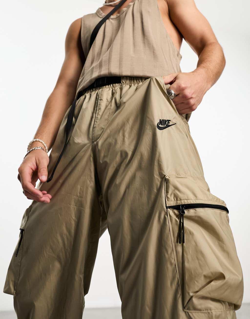 Nike Tech Essentials wind sweatpants in brown Product Image