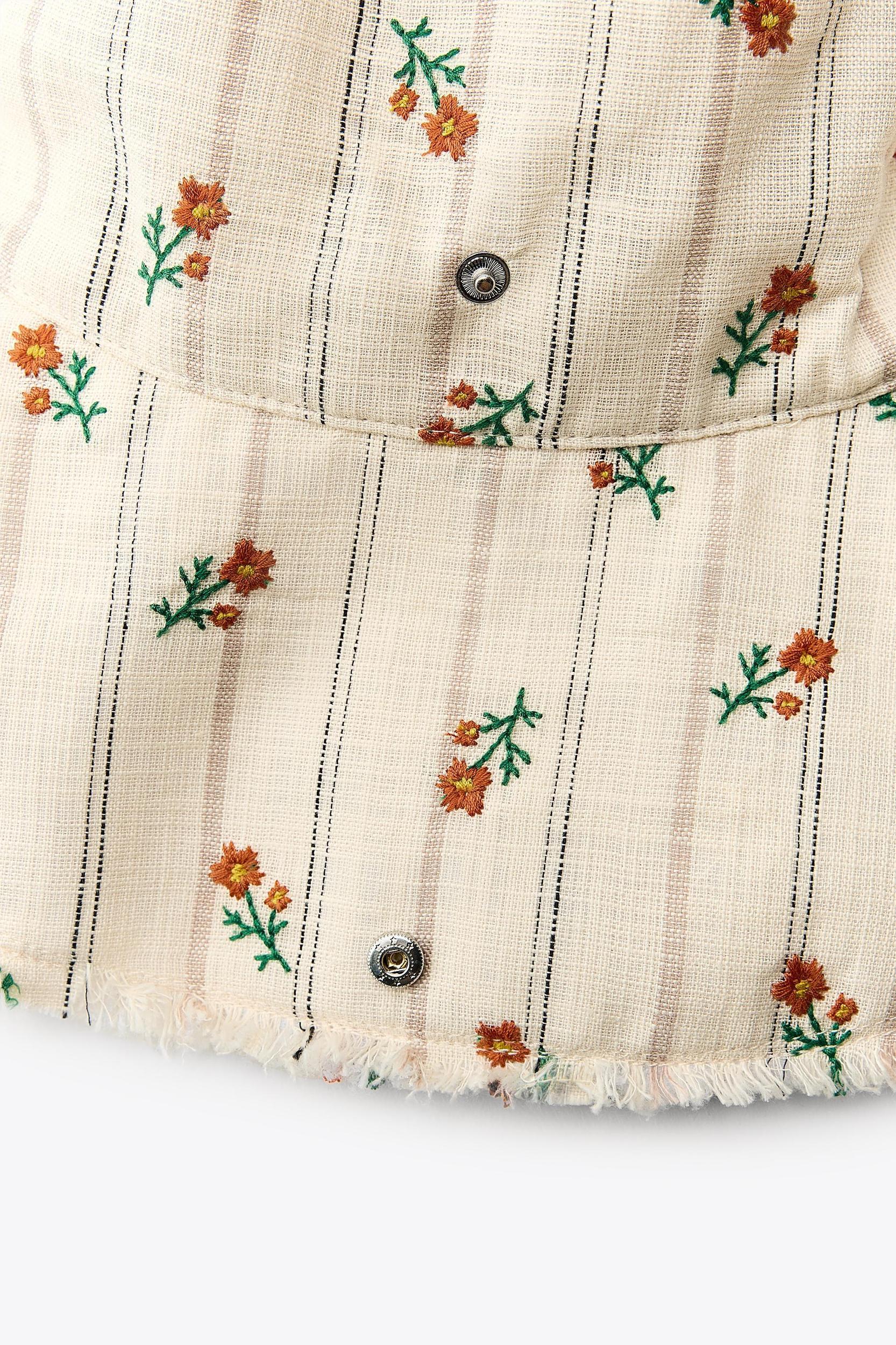 STRIPED FLORAL BUCKET HAT Product Image