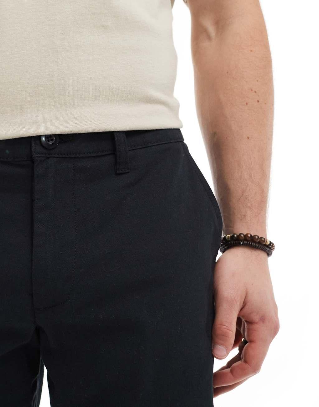 ASOS DESIGN tapered chinos in black Product Image