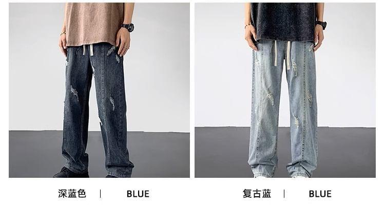 Drawstring Waist Washed Distressed Loose Fit Jeans Product Image