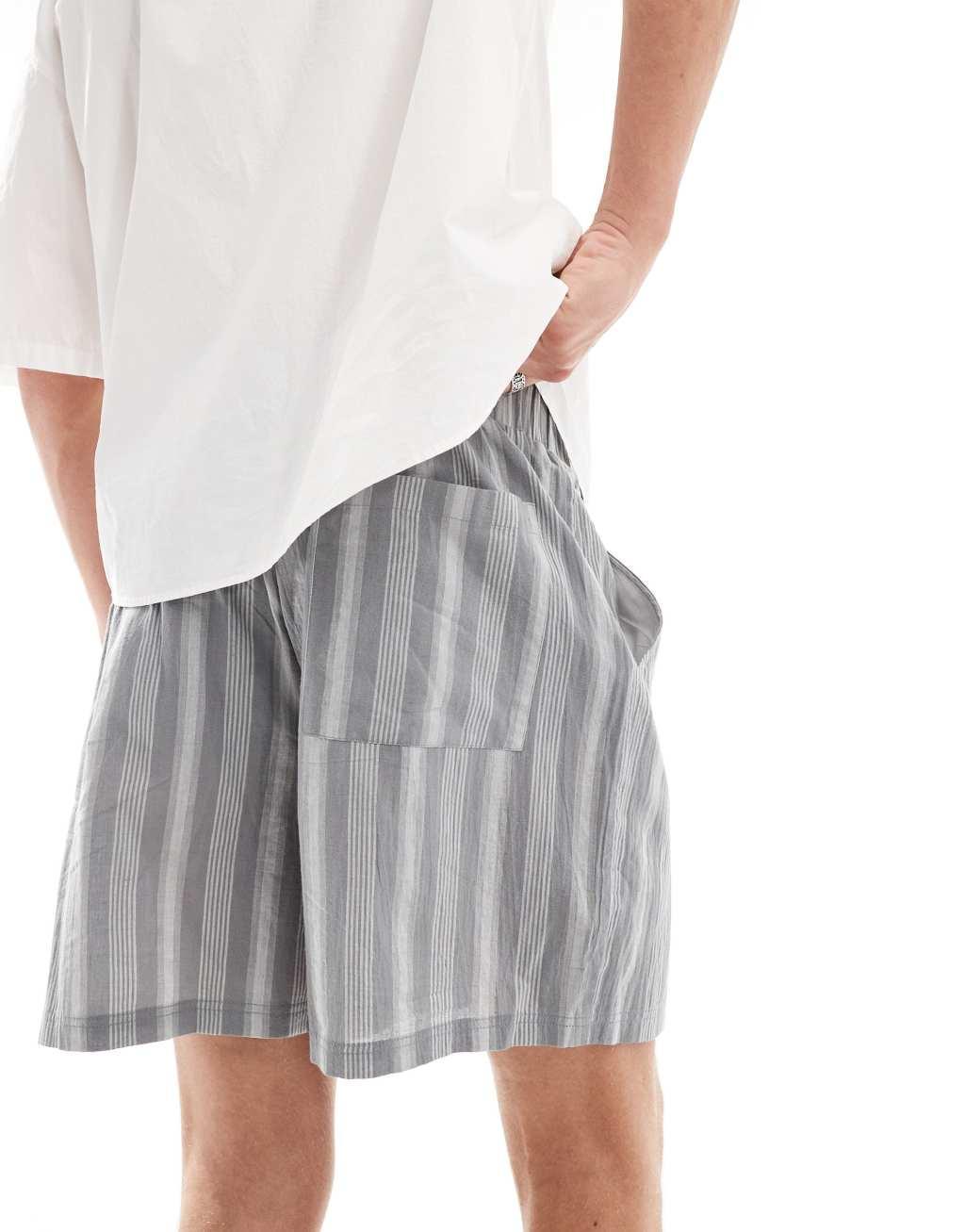 Reclaimed Vintage striped relaxed shorts in blue Product Image