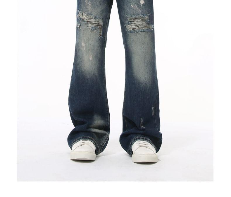 Mid Rise Washed Distressed Flared Jeans Product Image